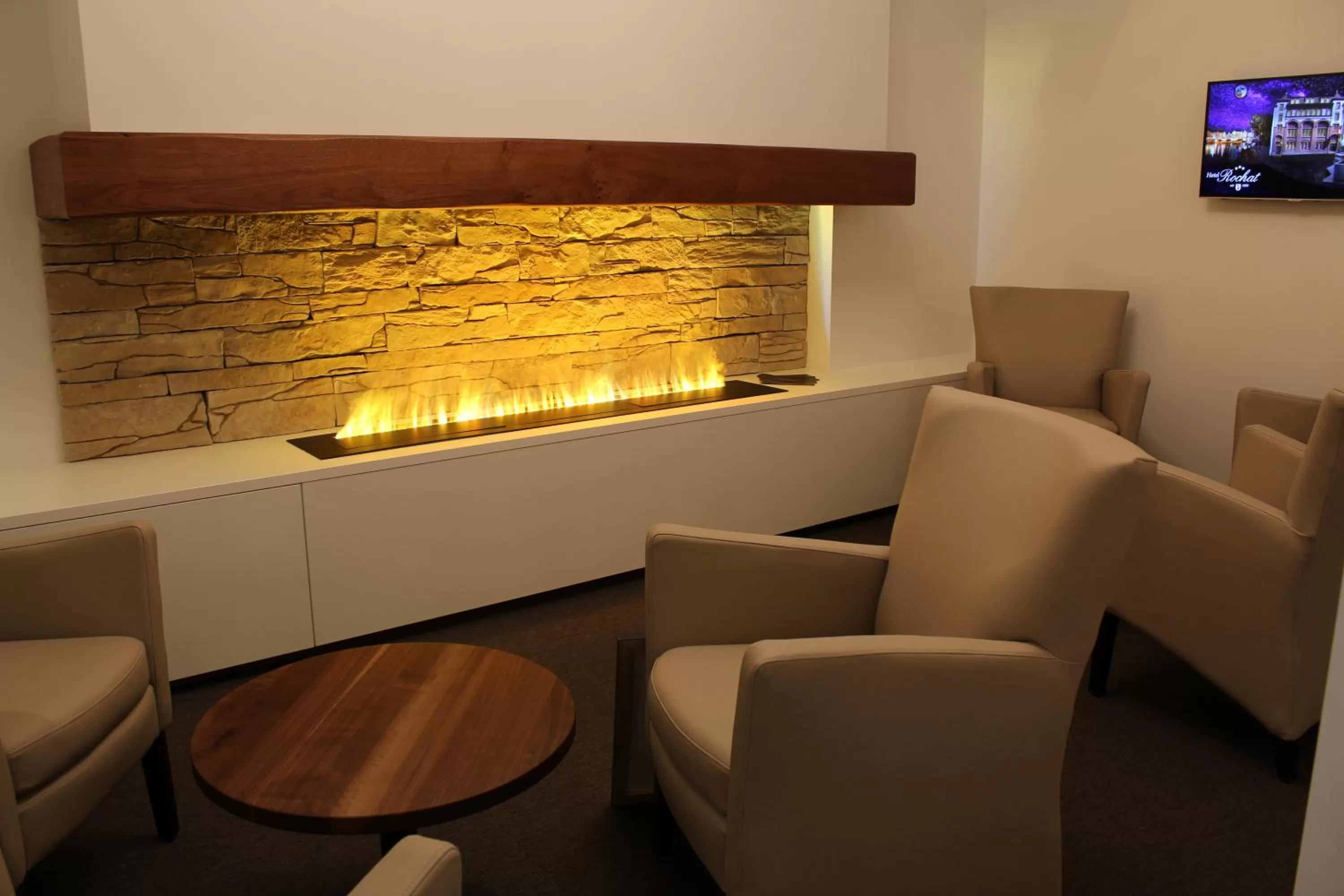 Communal lounge/ TV room in Central City Hotel Rochat