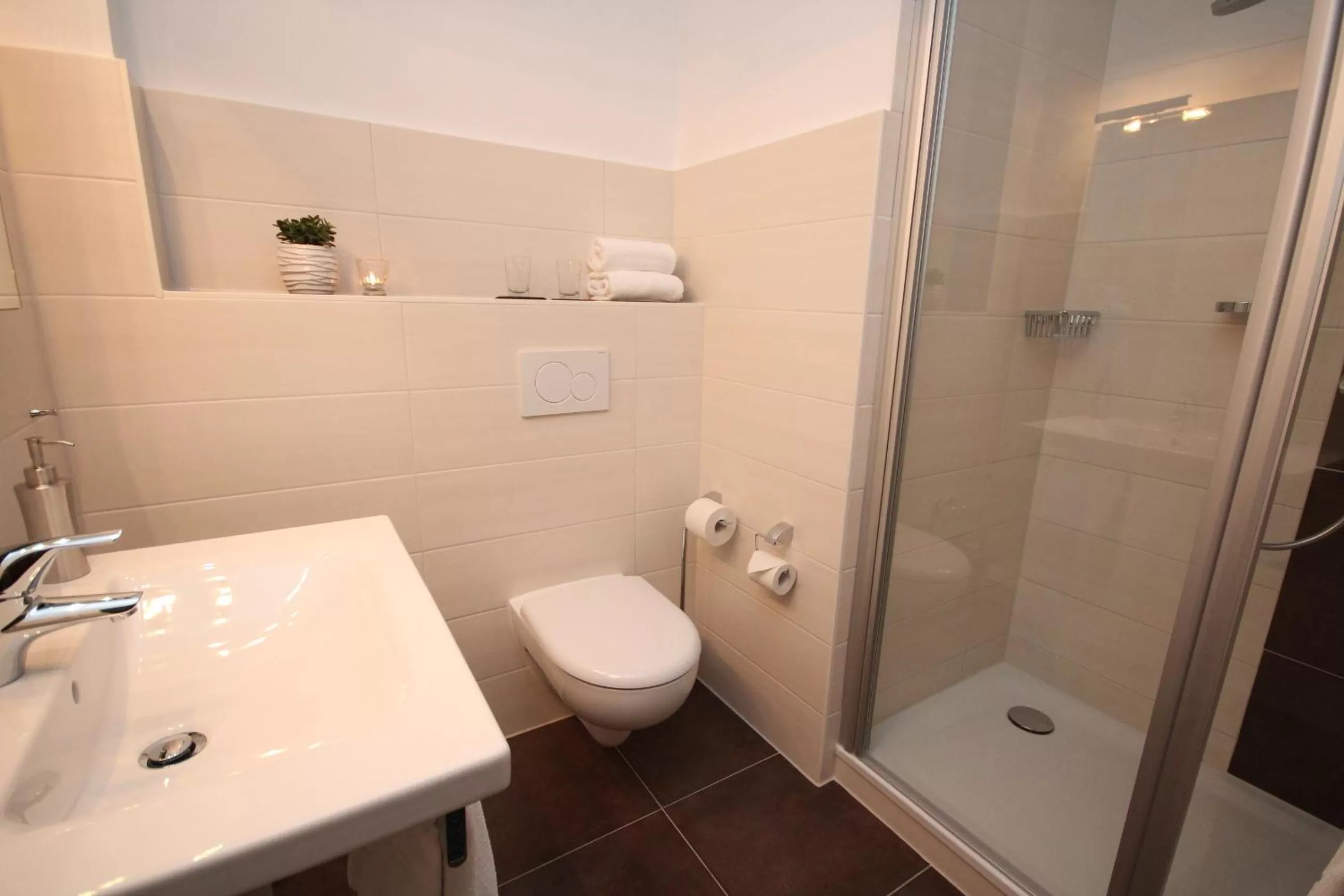 Shower in ONNO Boutique Hotel & Apartments