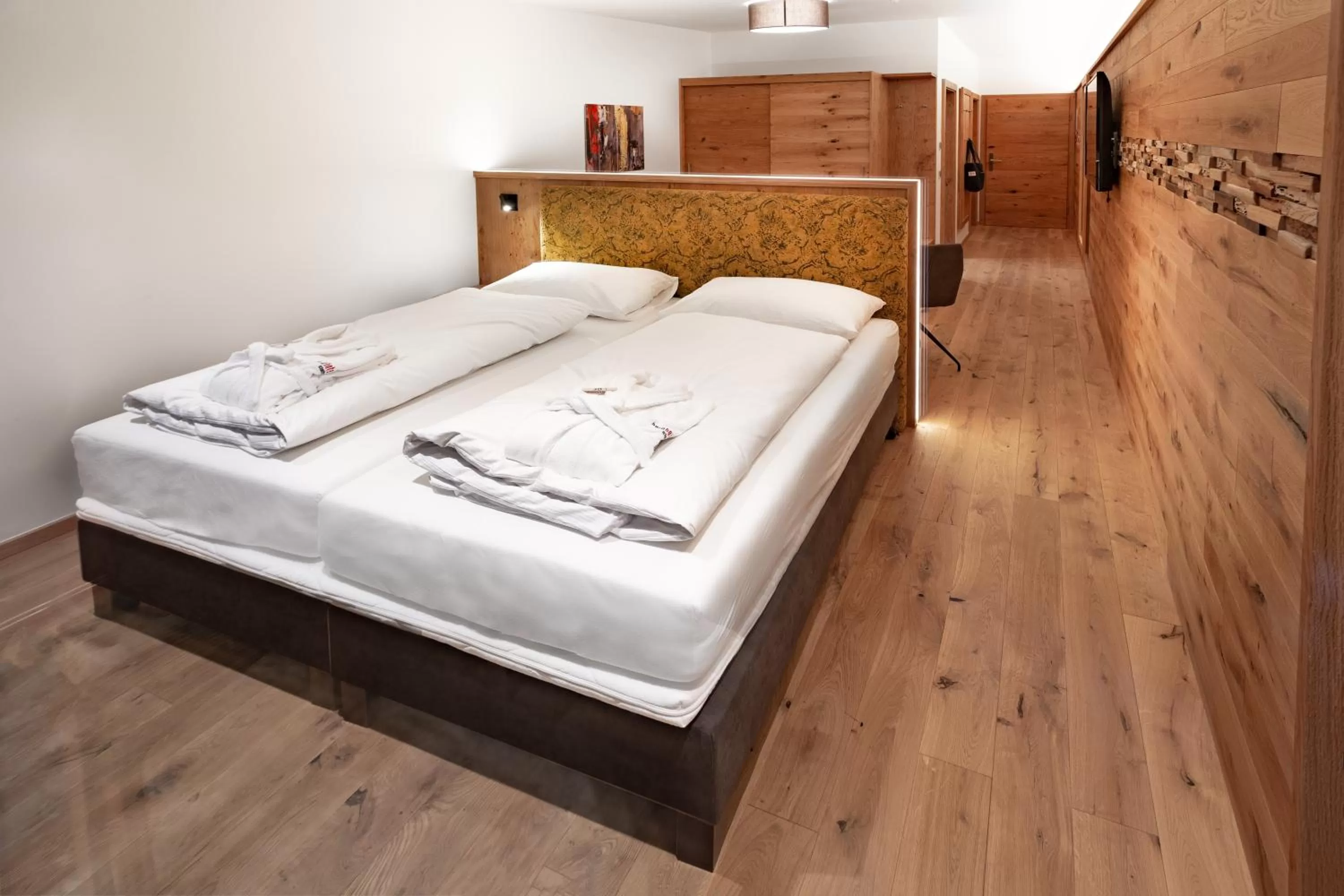 Bed in Berghotel Schmittenhöhe