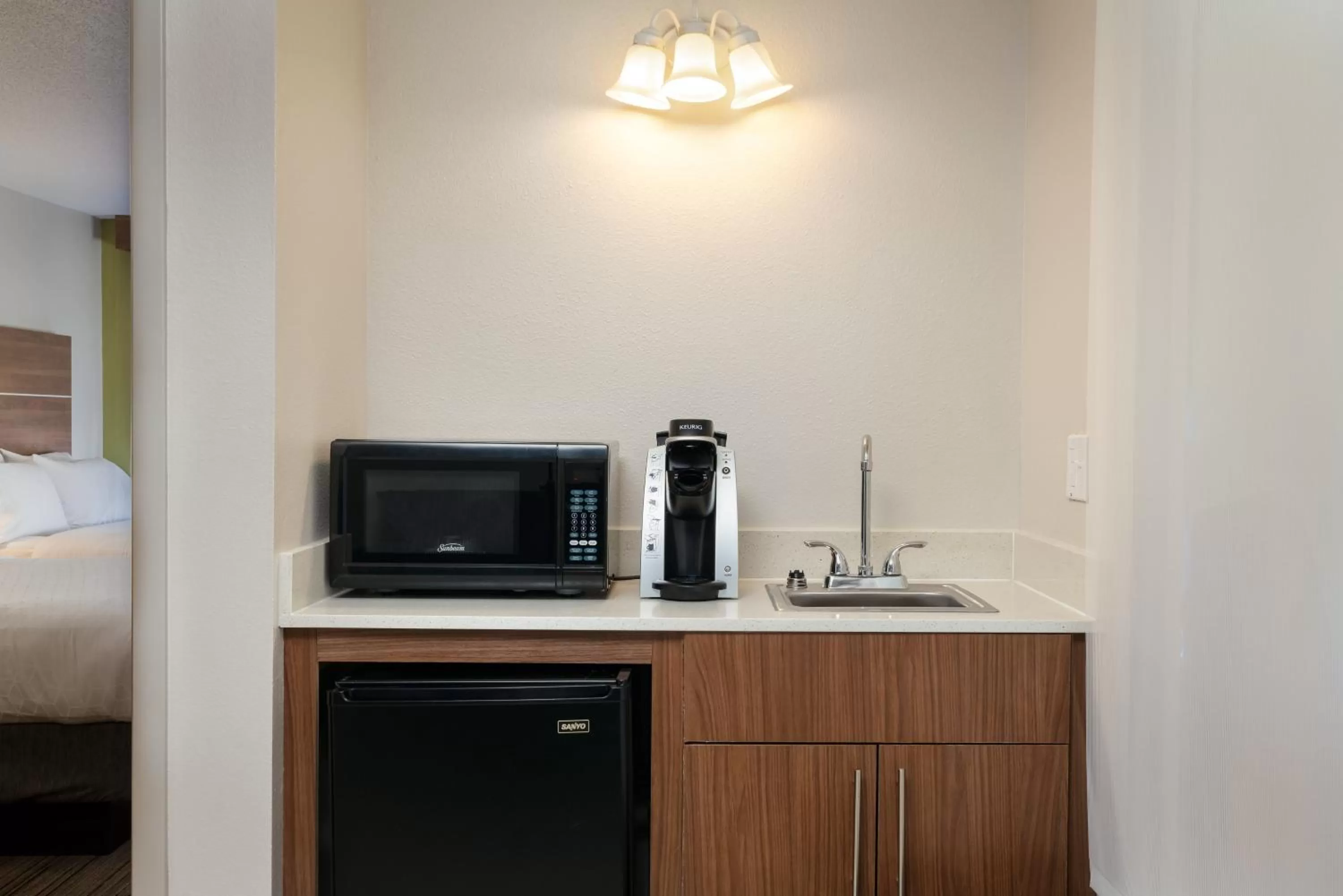 Bedroom in Holiday Inn Express & Suites Milton East I-10 by IHG