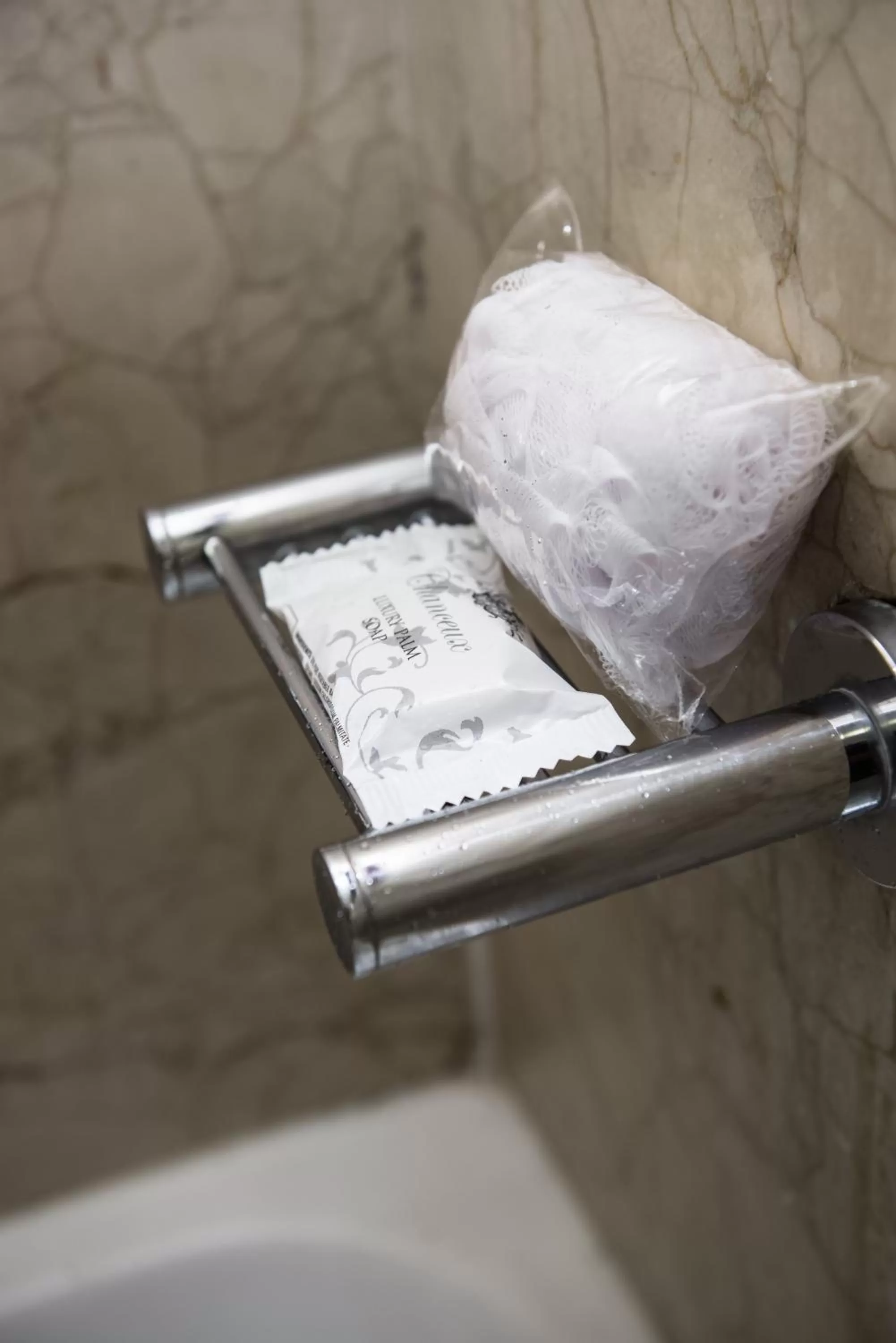 Bathroom in Belaire Suites Hotel
