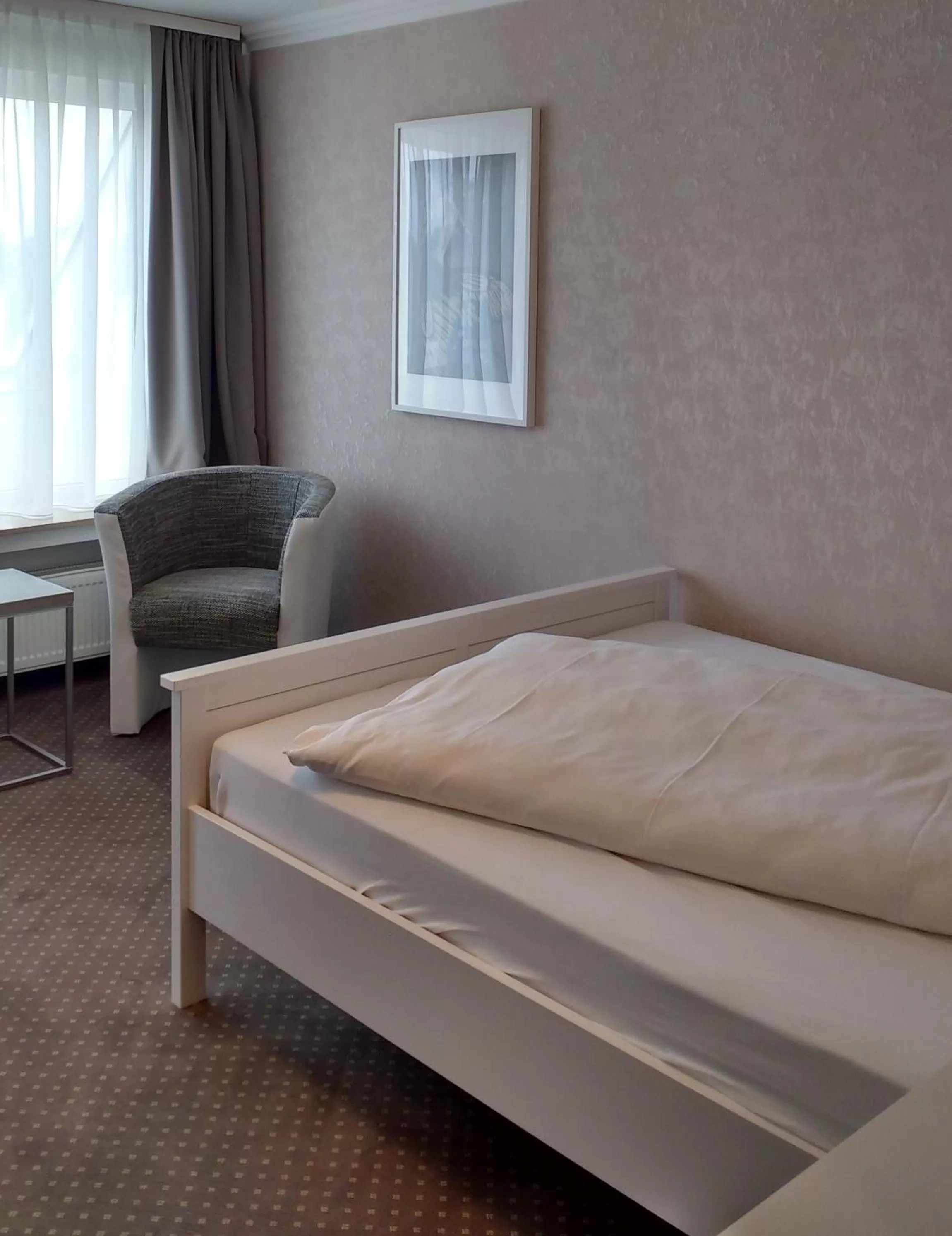 Bed in artHOTEL Bremen