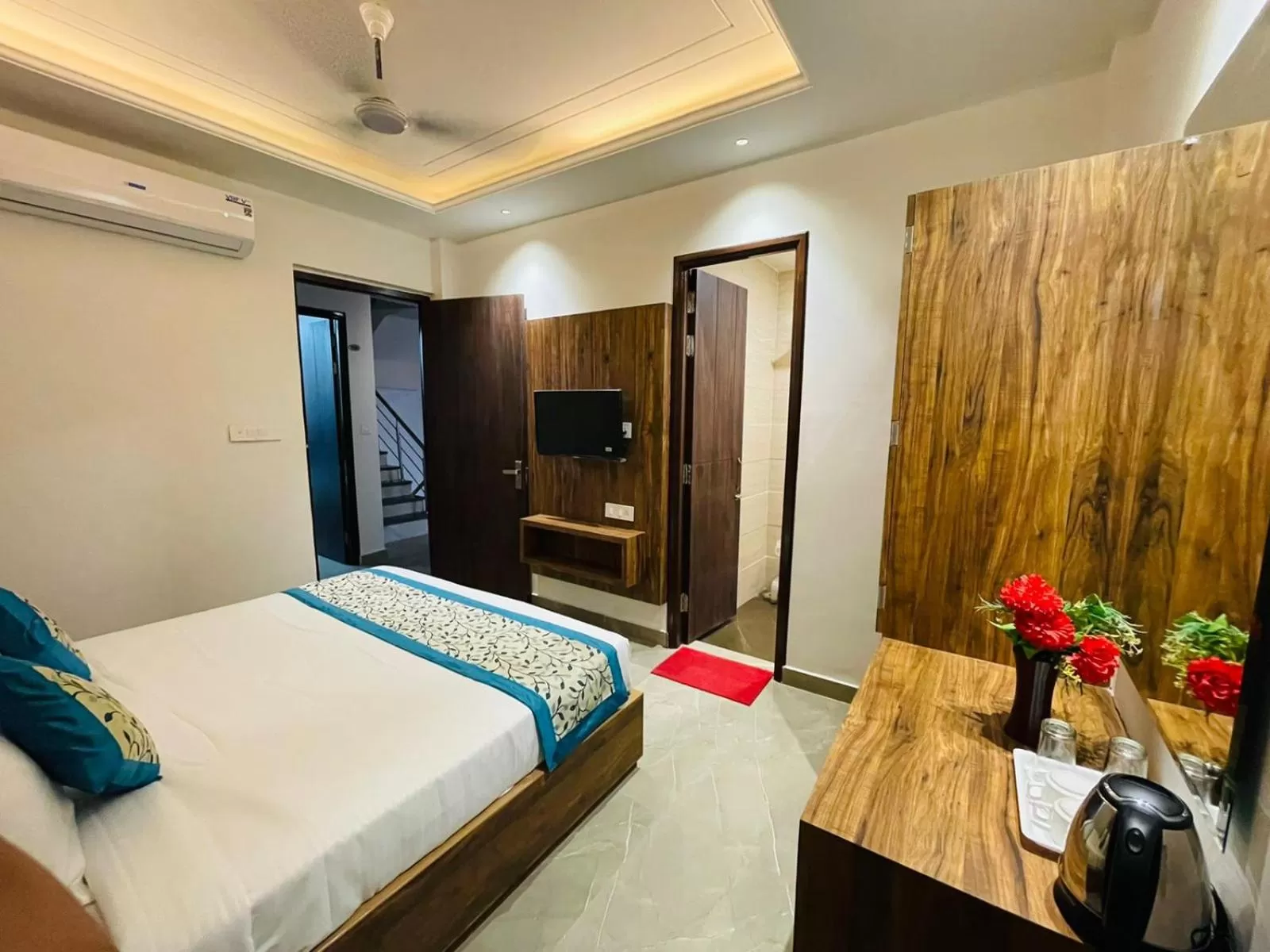 Photo of the whole room in Hotel Dream Town By Cozy Hotels & Resorts