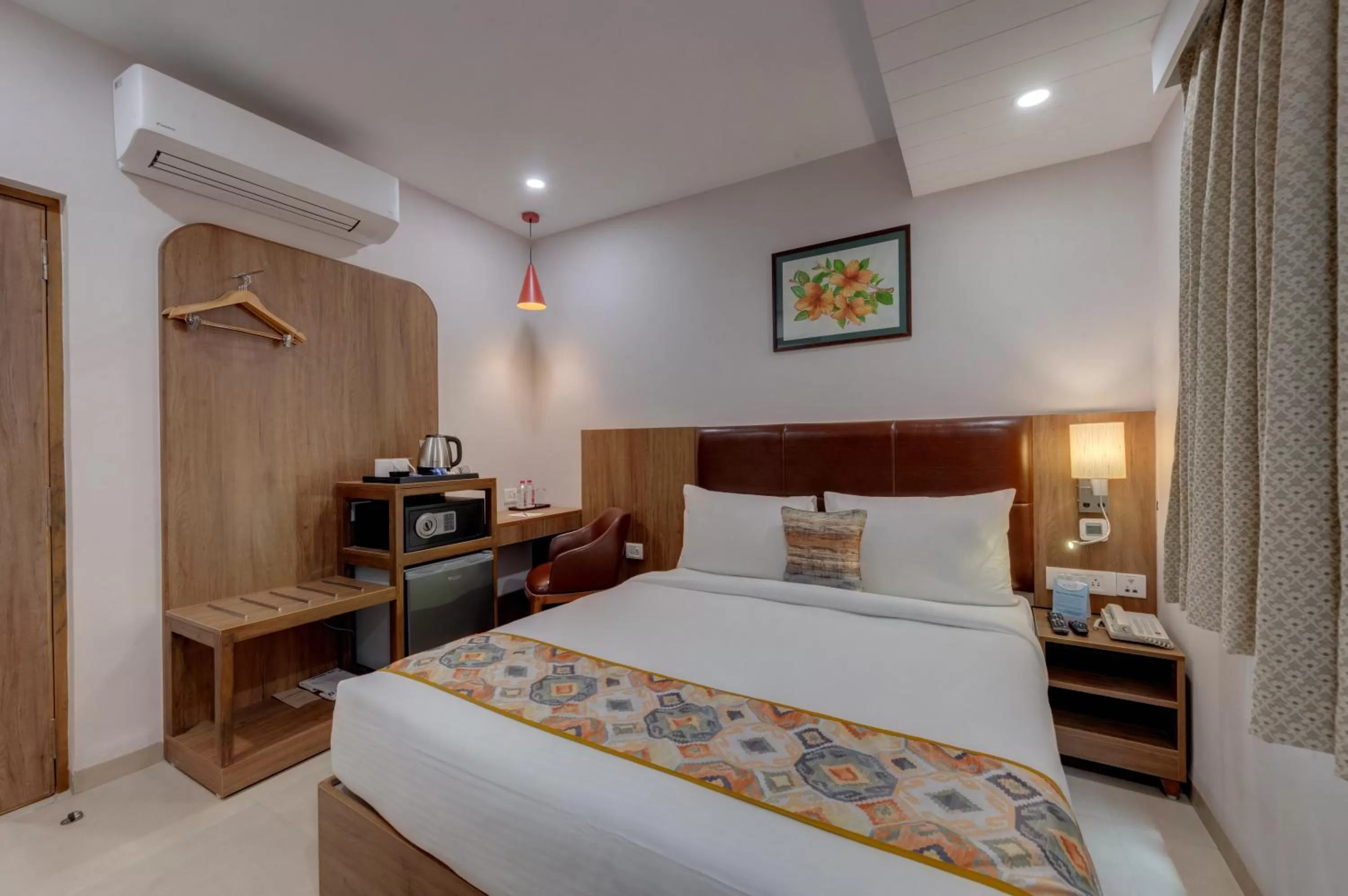 Bed in The Beacon Hotel Vadodara