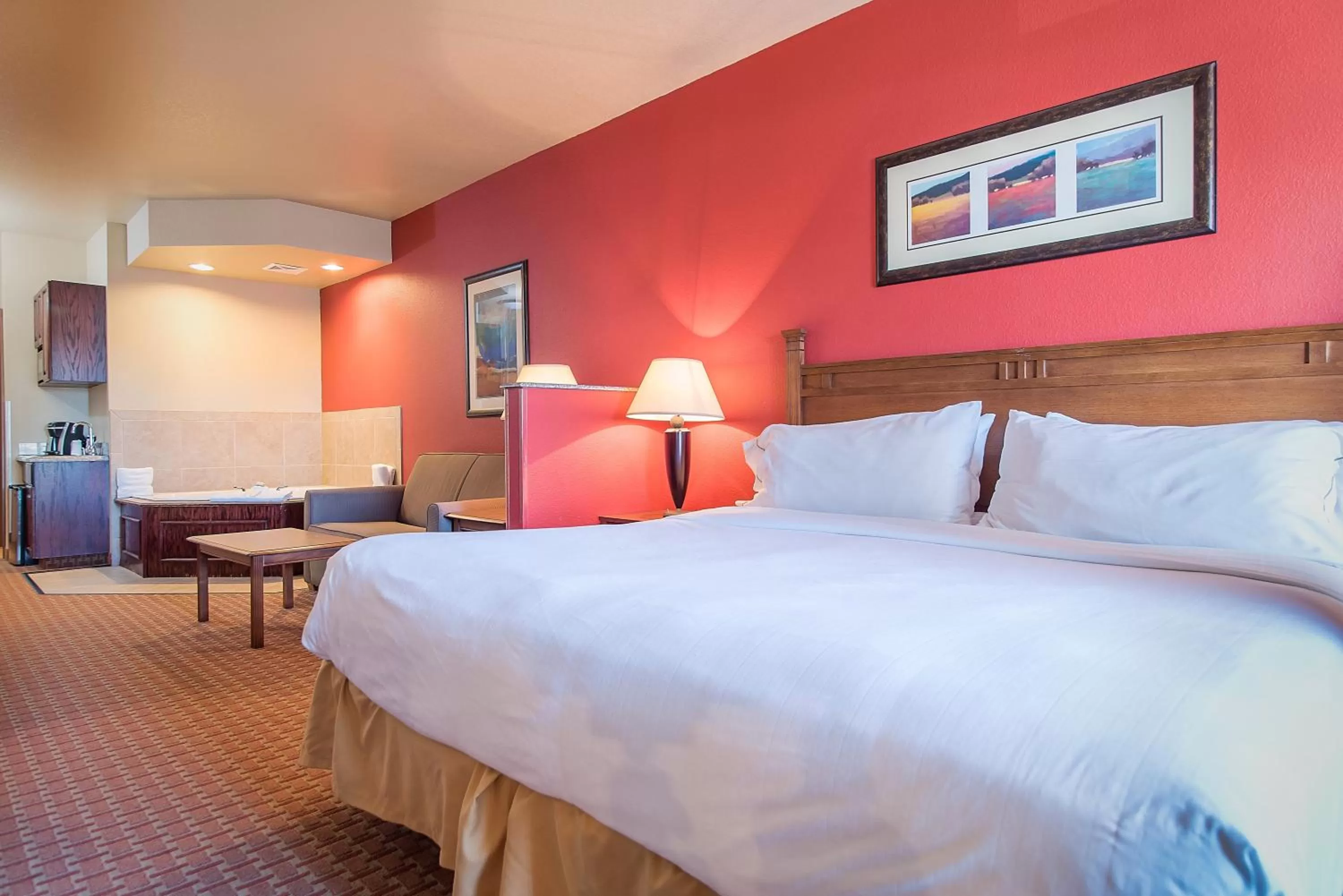 Bed in Baymont Inn & Suites by Wyndham Sturgis