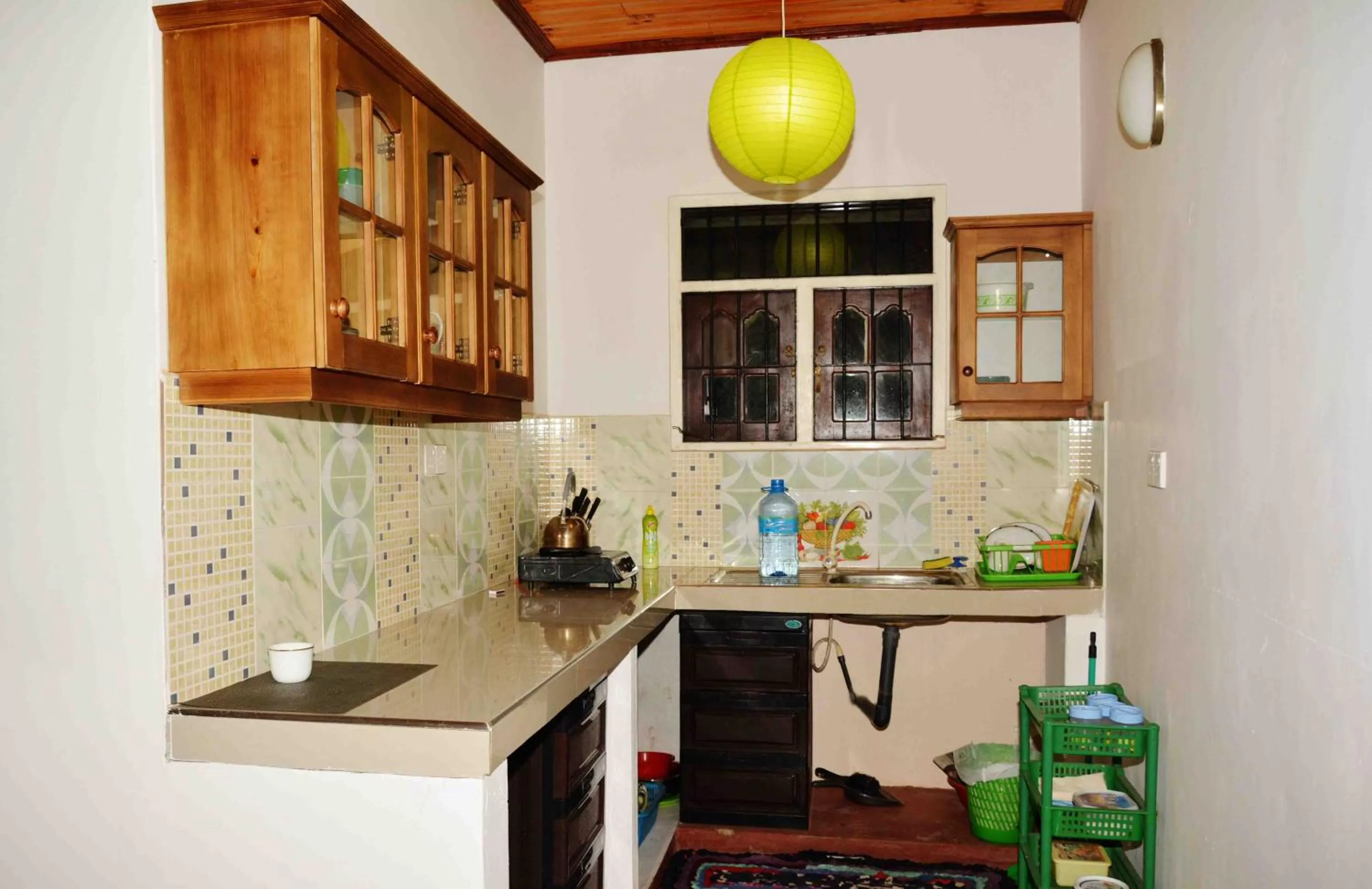 Kitchen or kitchenette in Sampathaa Residence