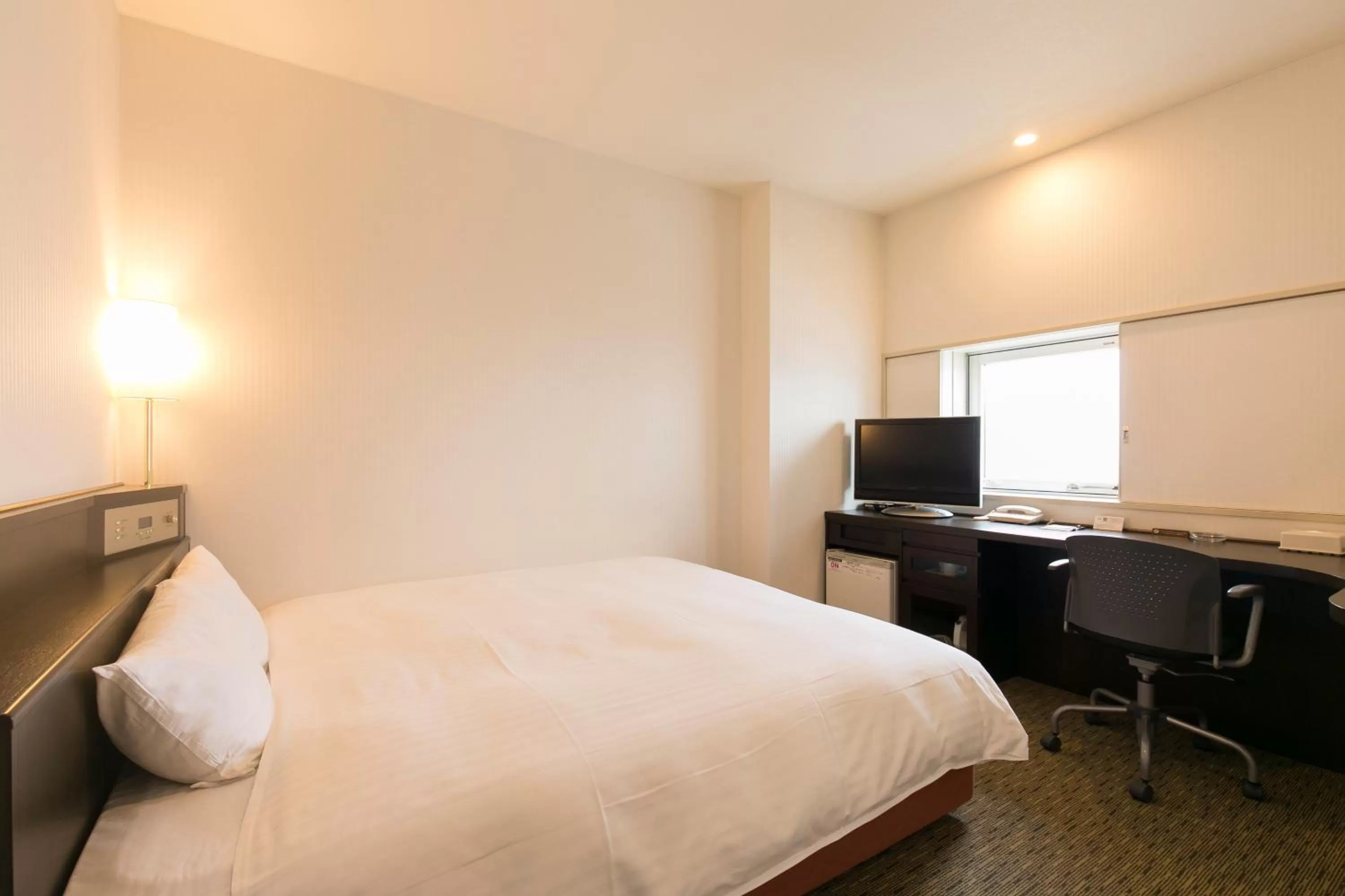 Bedroom, Bed in Nishitetsu Inn Kurosaki