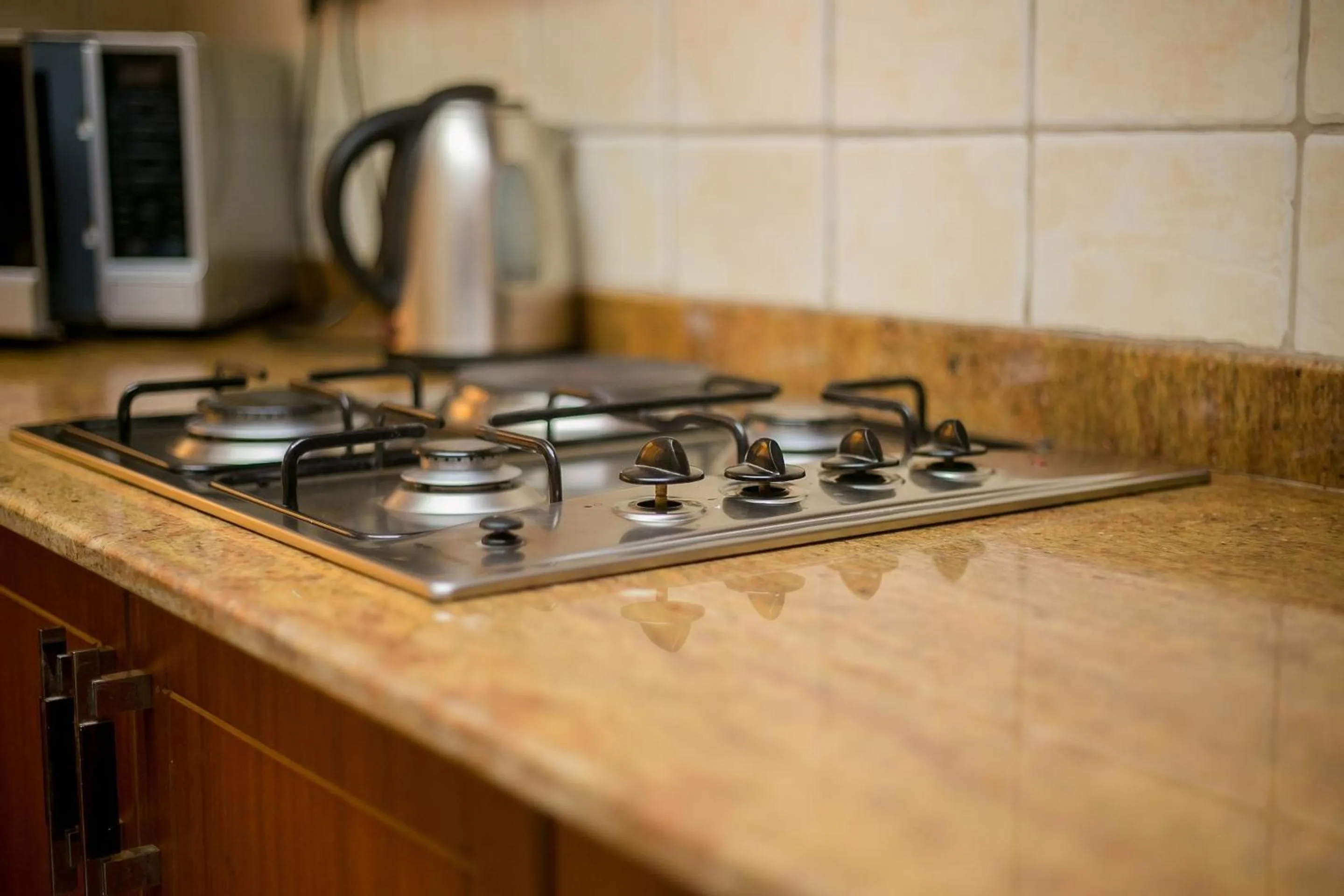 Kitchen or kitchenette in Waridi Paradise Hotel and Suites