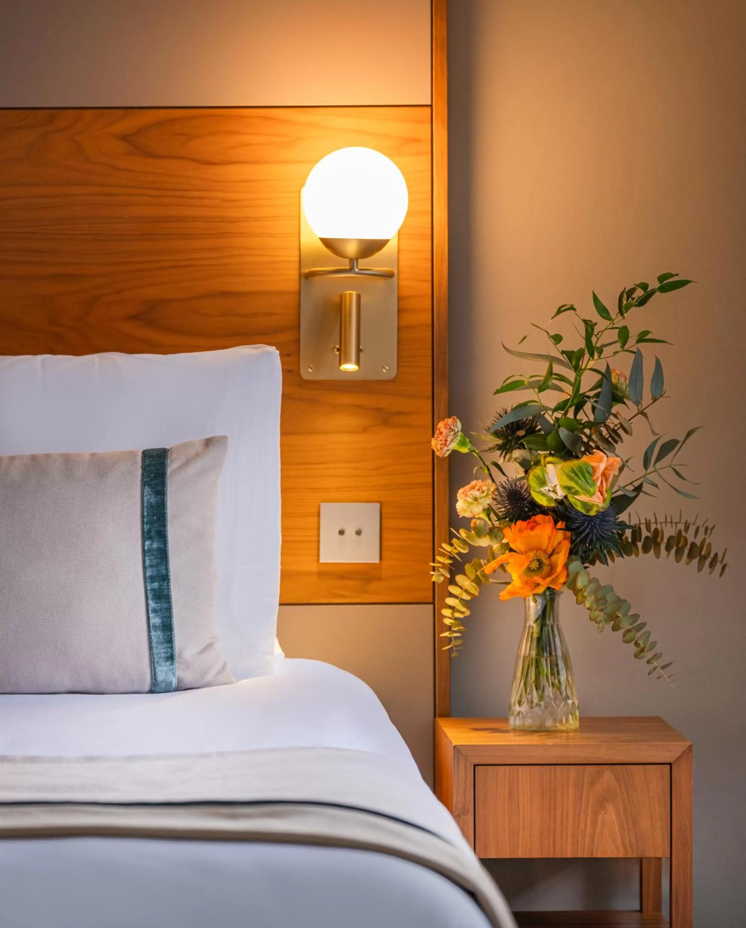 Decorative detail, Bed in Hôtel Le Tourville by Inwood Hotels