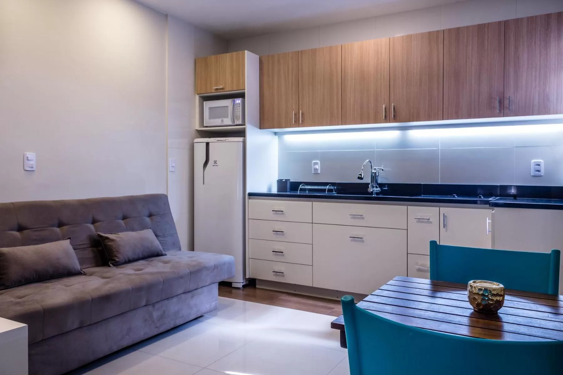 Kitchen or kitchenette in Injoy Suítes & Aparts