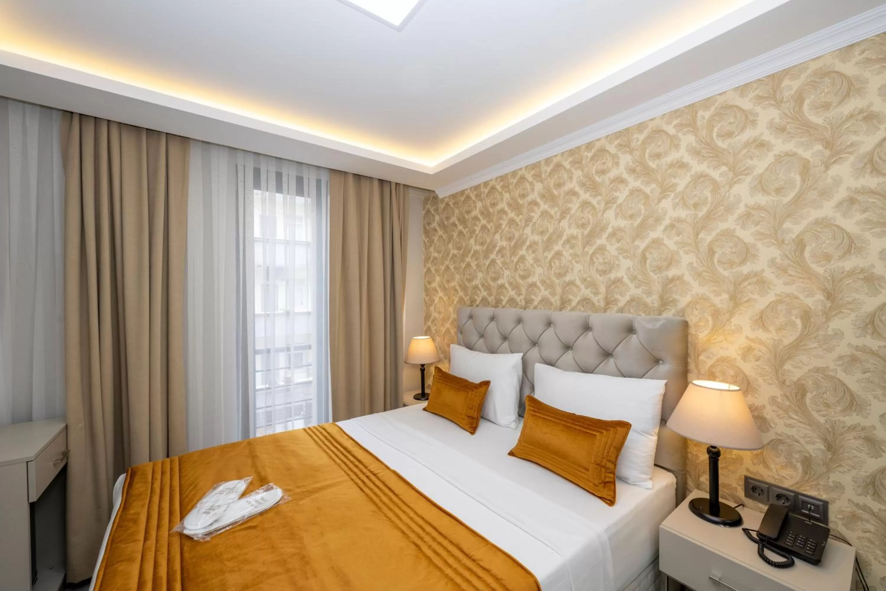 Bed in SKYSTAR DELUXE HOTEL