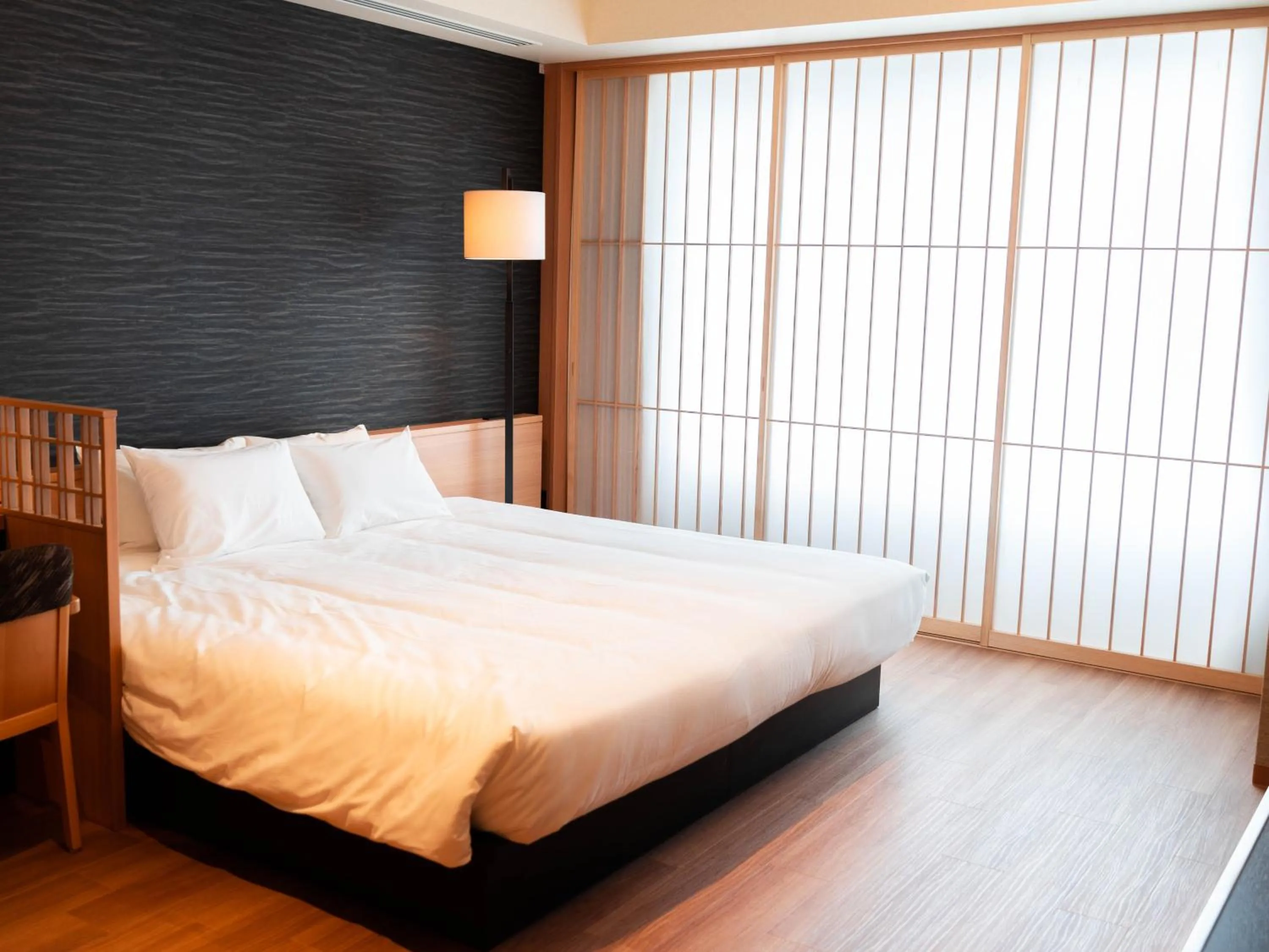 Bed in Hakodate Yunokawa Onsen Umi to Akari Hewitt Resort