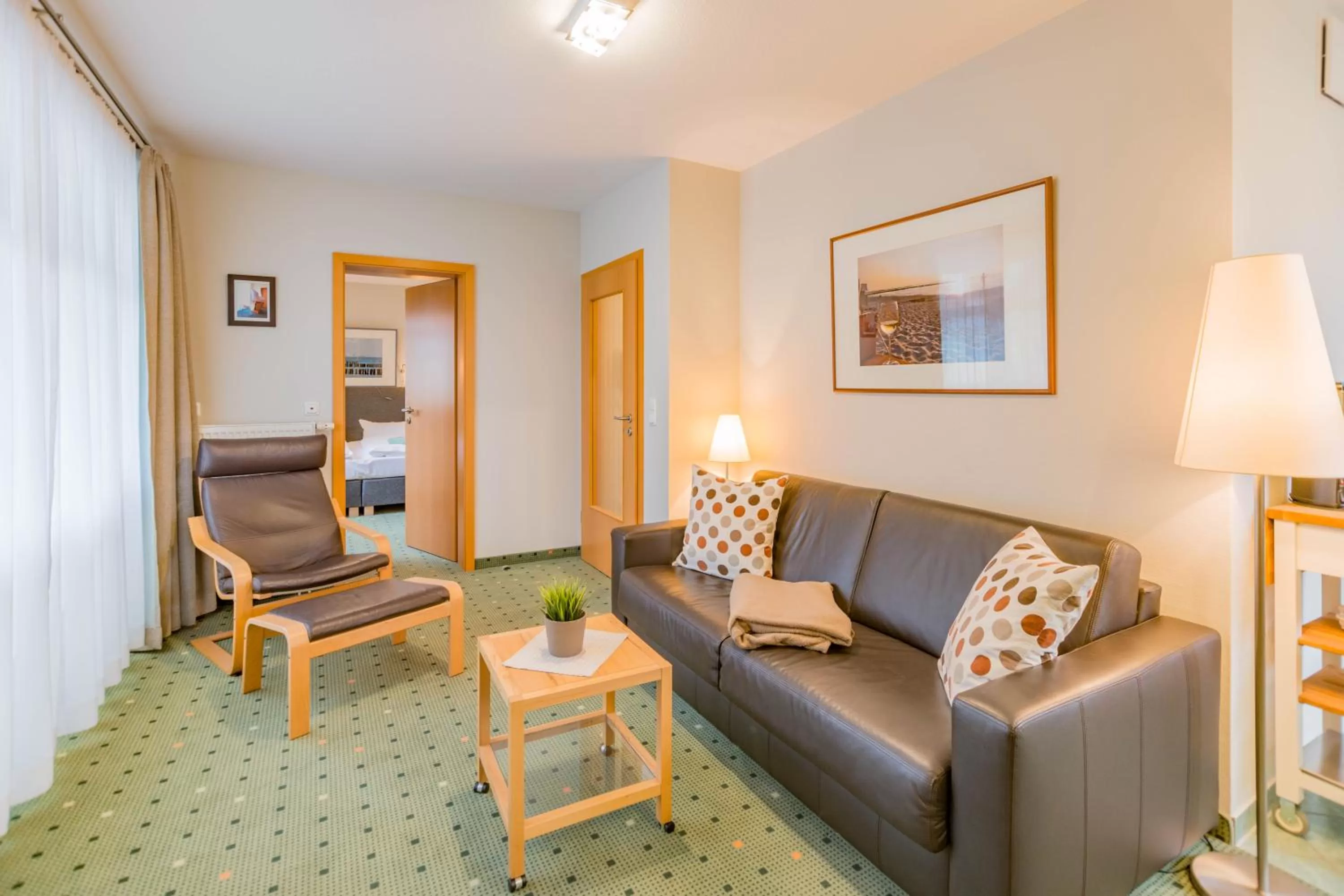 Photo of the whole room, Seating Area in Am Weststrand Apartmenthaus Waldeck