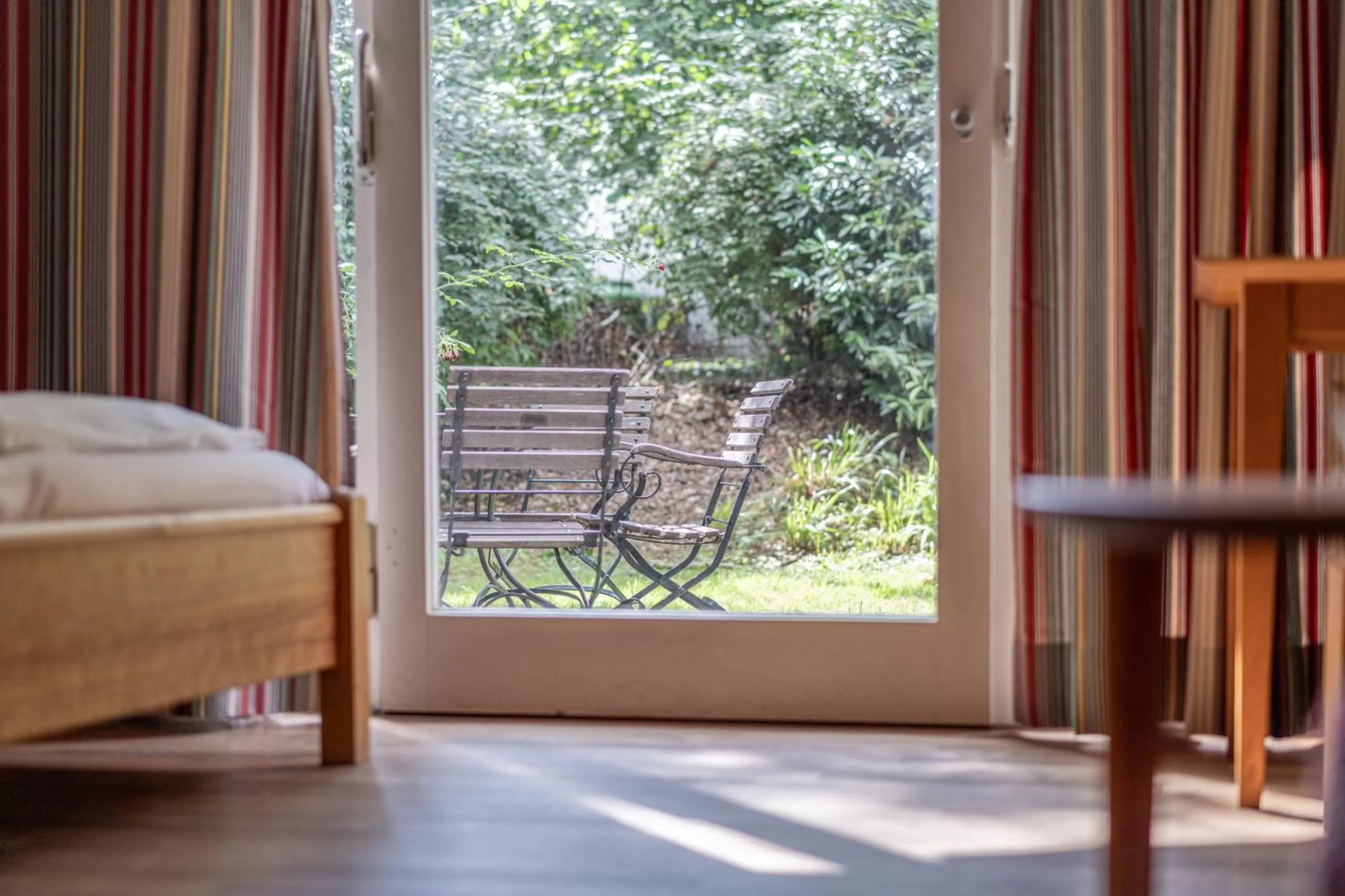 Garden view, Bed in Genusshotel Alte Post
