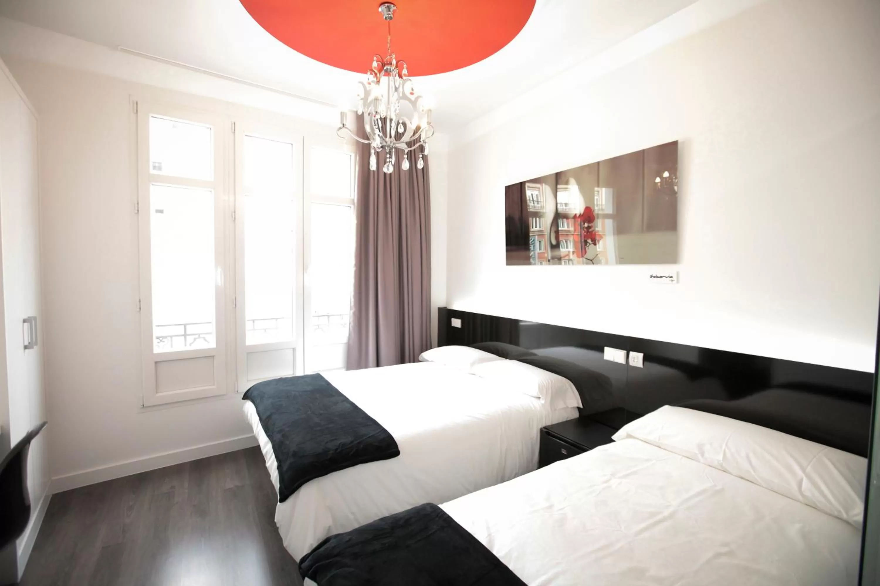 Photo of the whole room, Bed in Vitium Urban Suites