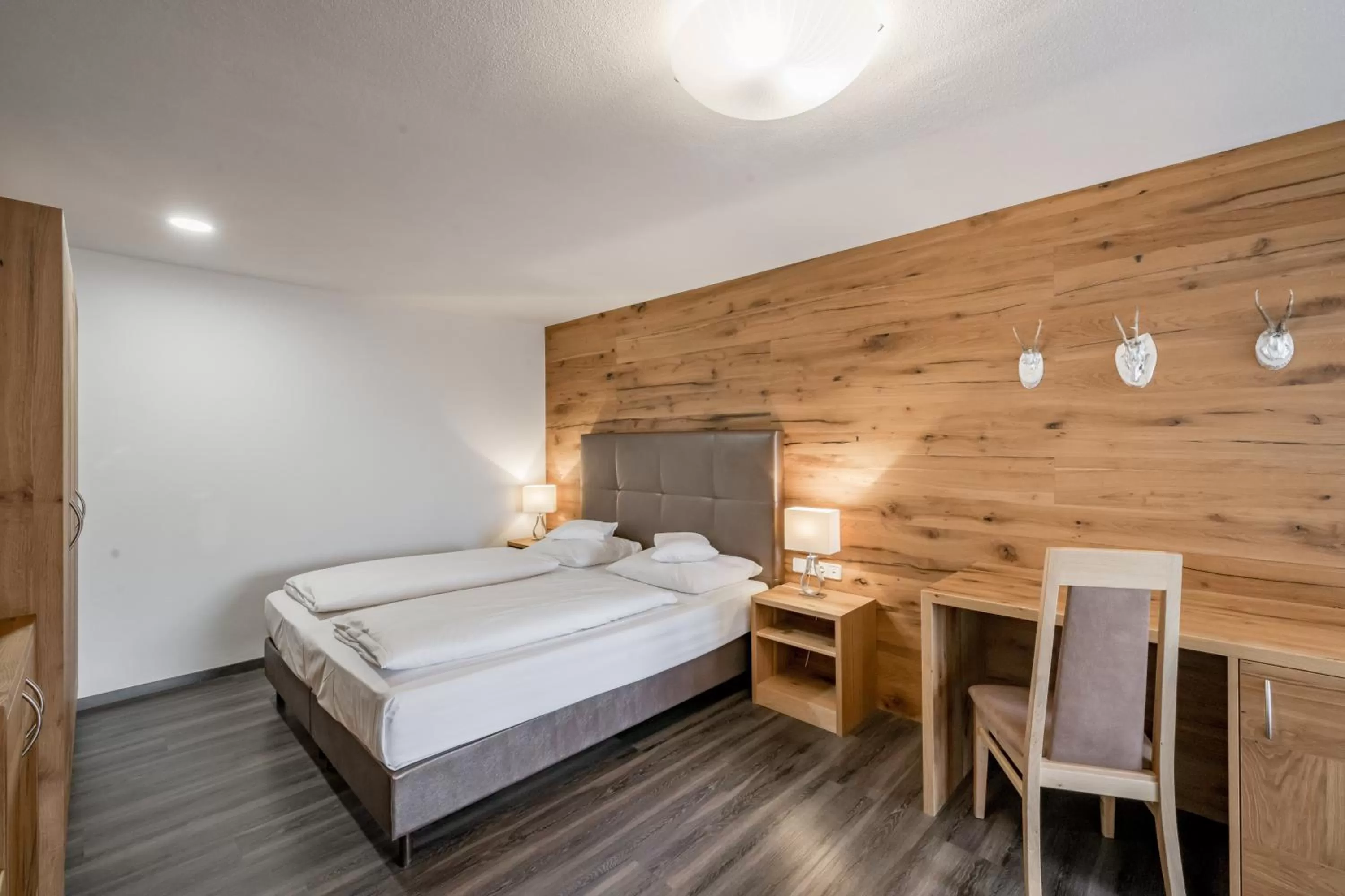 Photo of the whole room, Bed in Hotel Zum Gourmet