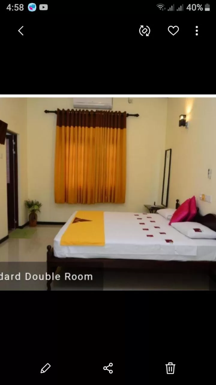 Bed in Jayasinghe Holiday Resort