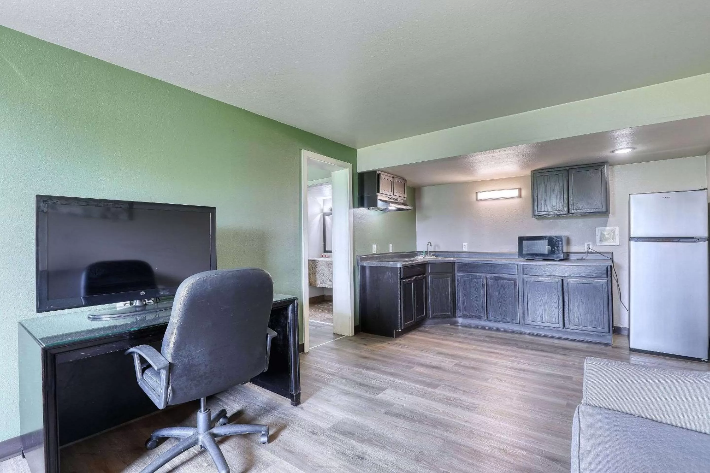 Bedroom in Suburban Studios Neenah-Appleton