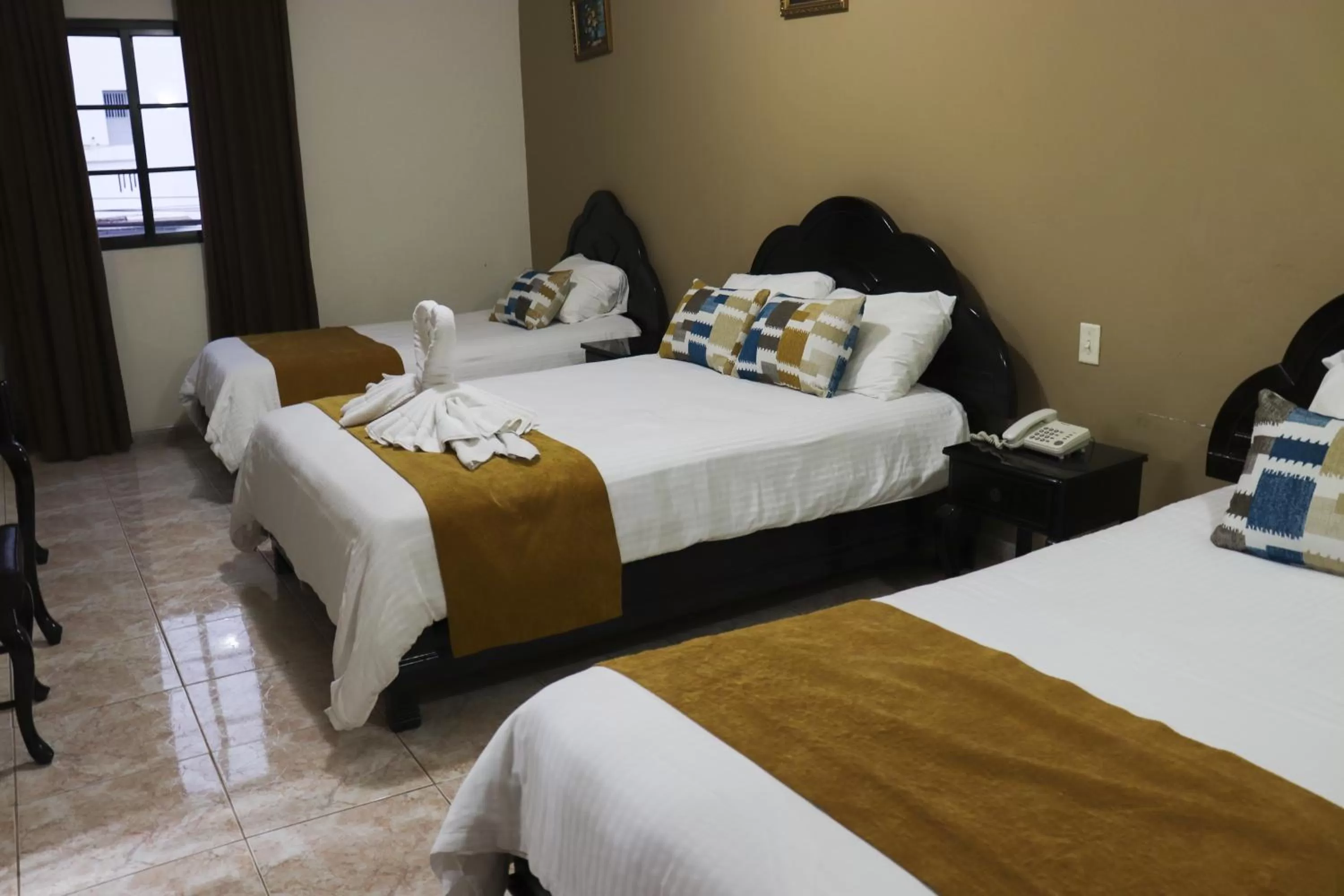 Bed in Hotel Puerta del Sol