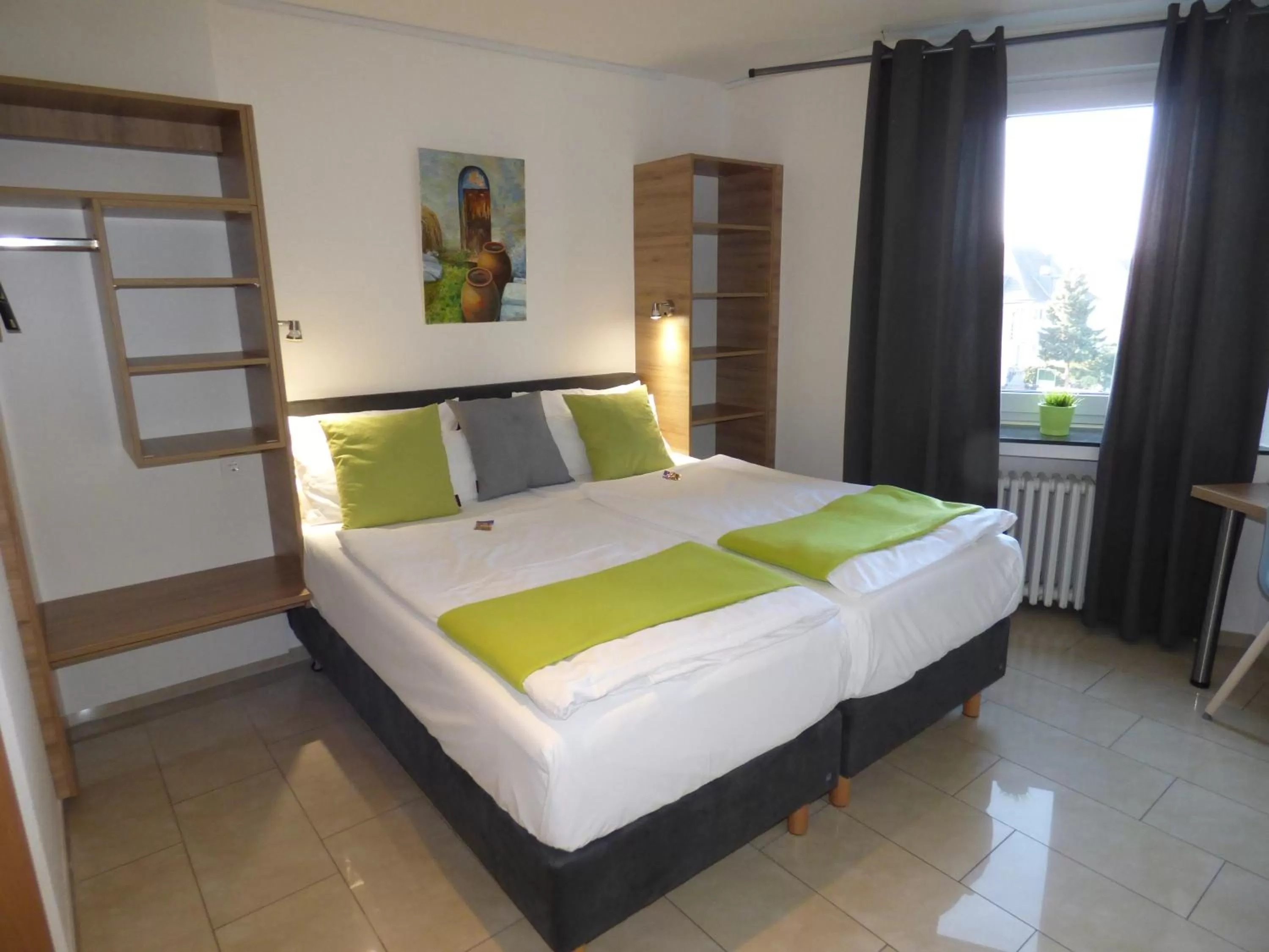 Bed in Hotel Art Inn Dinslaken