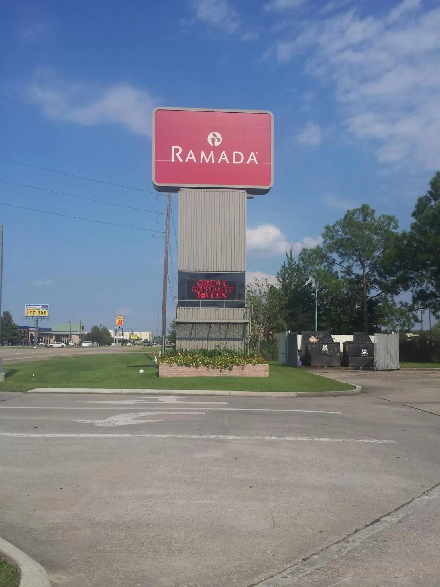 Property logo or sign in Ramada by Wyndham New Iberia