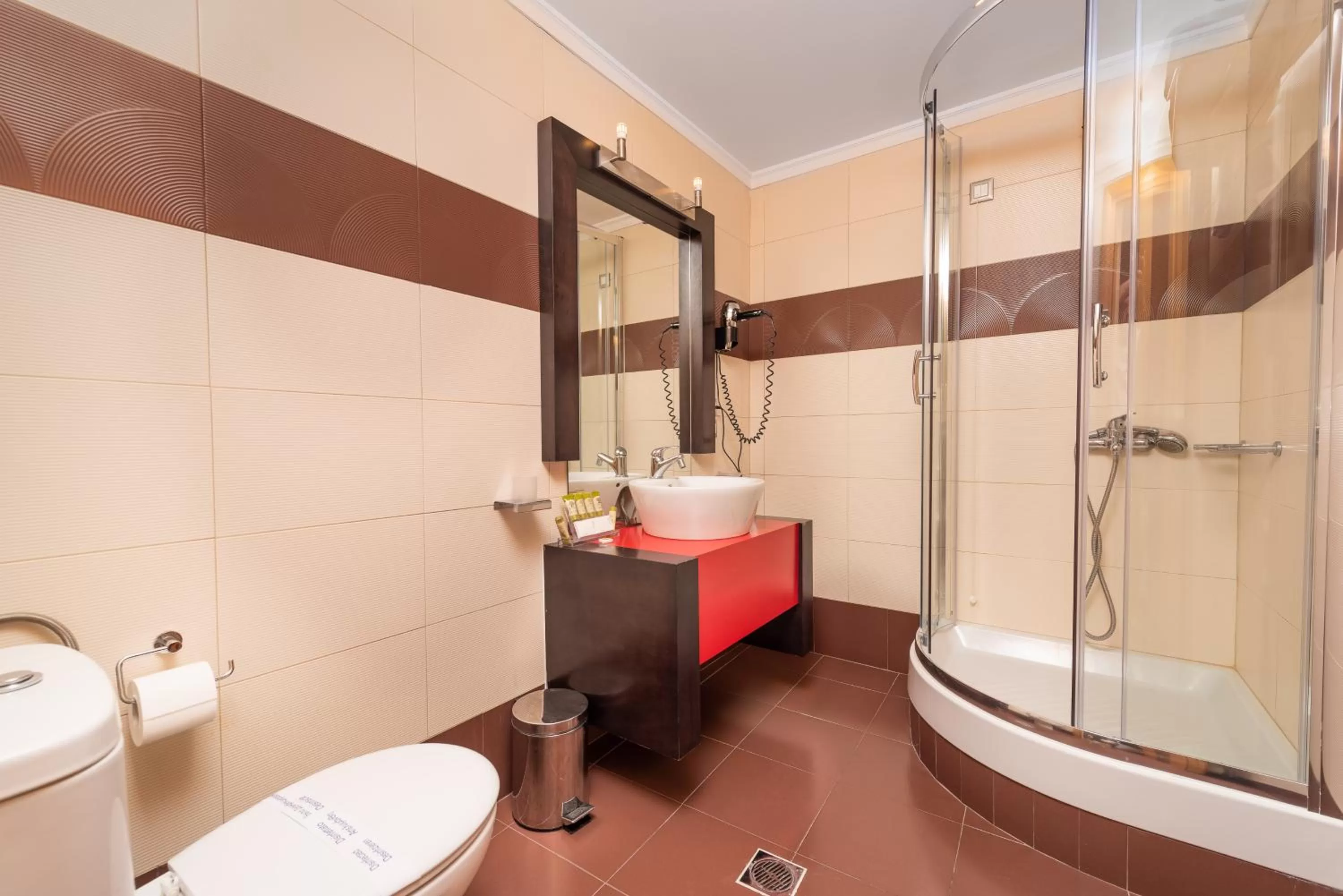 Shower in Heliotrope Hotels