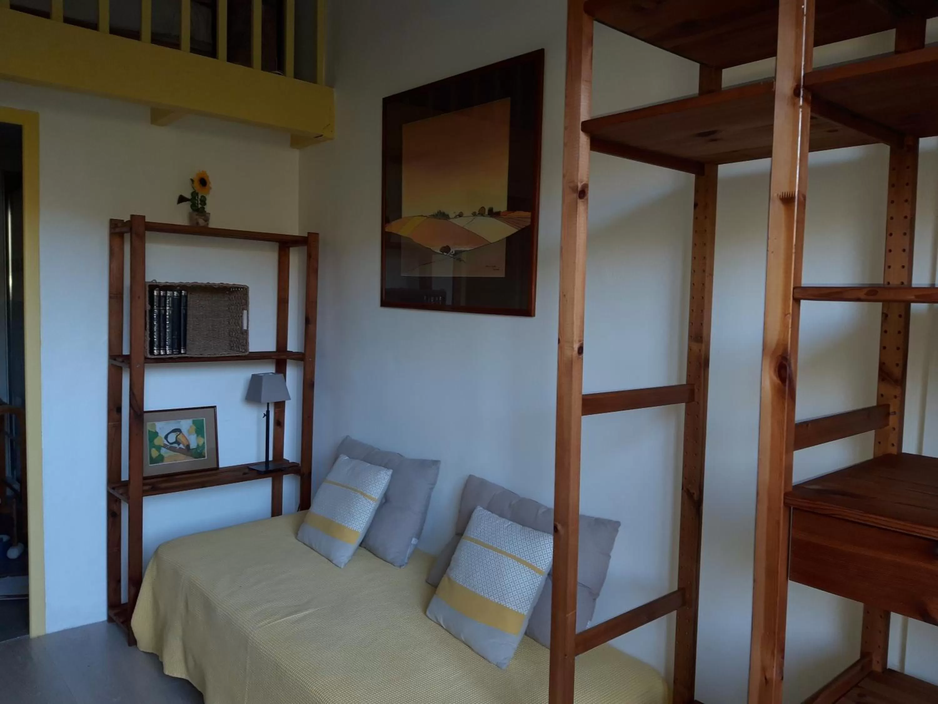 Seating area, Bed in Chambres d'Hôtes Aux Tournesols