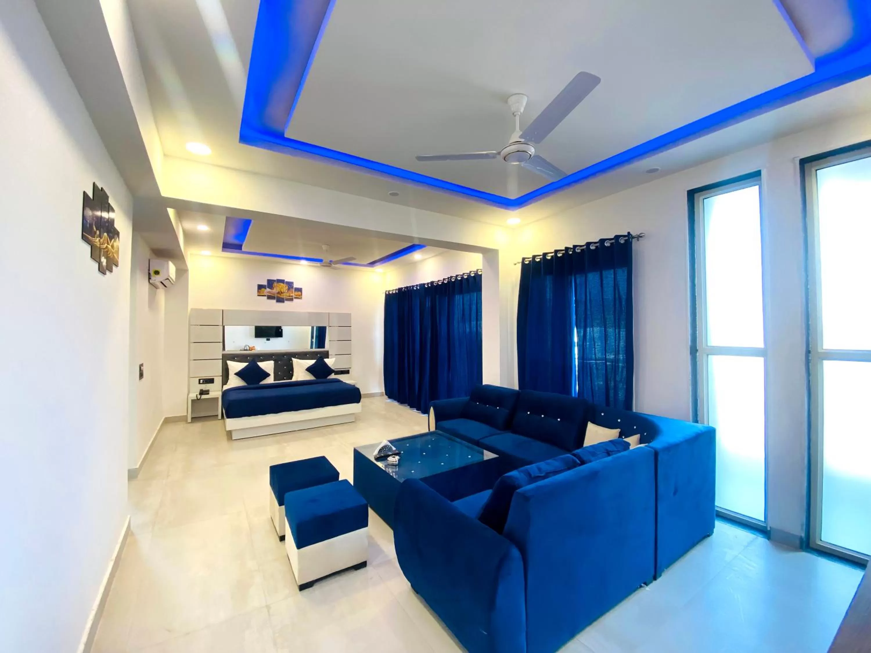 Bedroom, Seating Area in The Metro Stay By F9 Hotels-Near Sector 18 Metro Station Noida