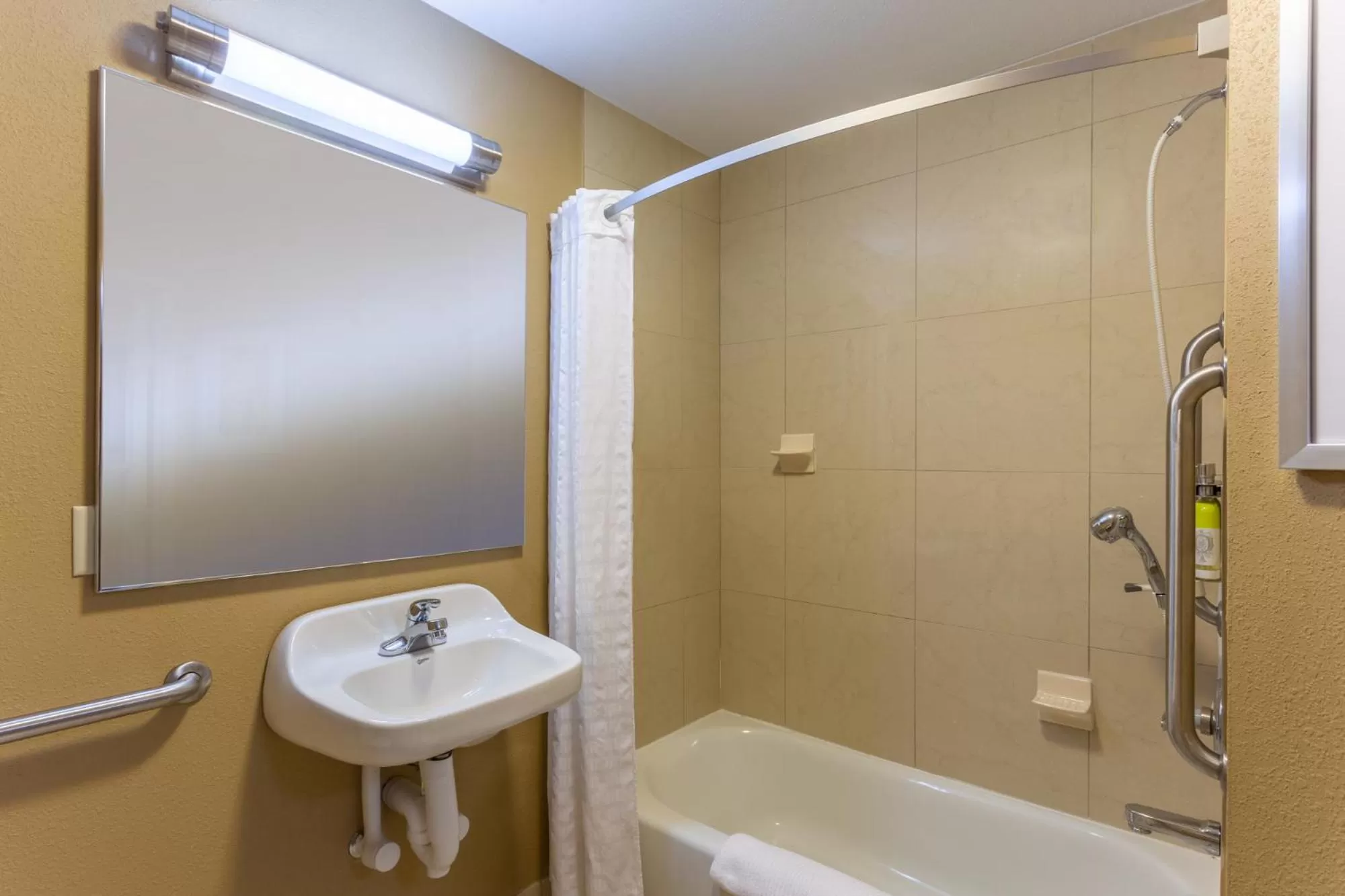 Bathroom in Candlewood Suites South Bend Airport by IHG