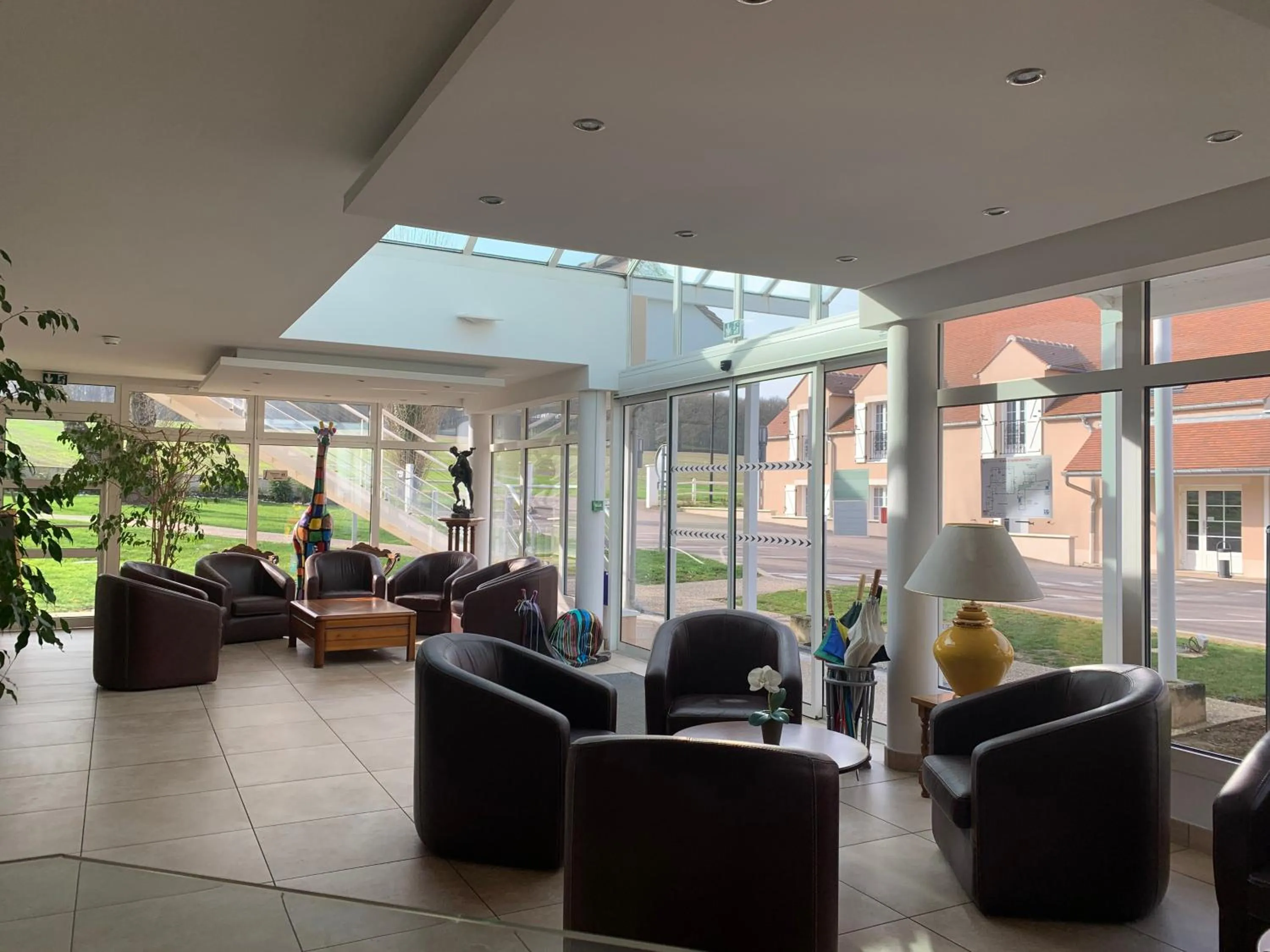 Living room in Logis Hôtel Restaurant Le Moulin de la Coudre
