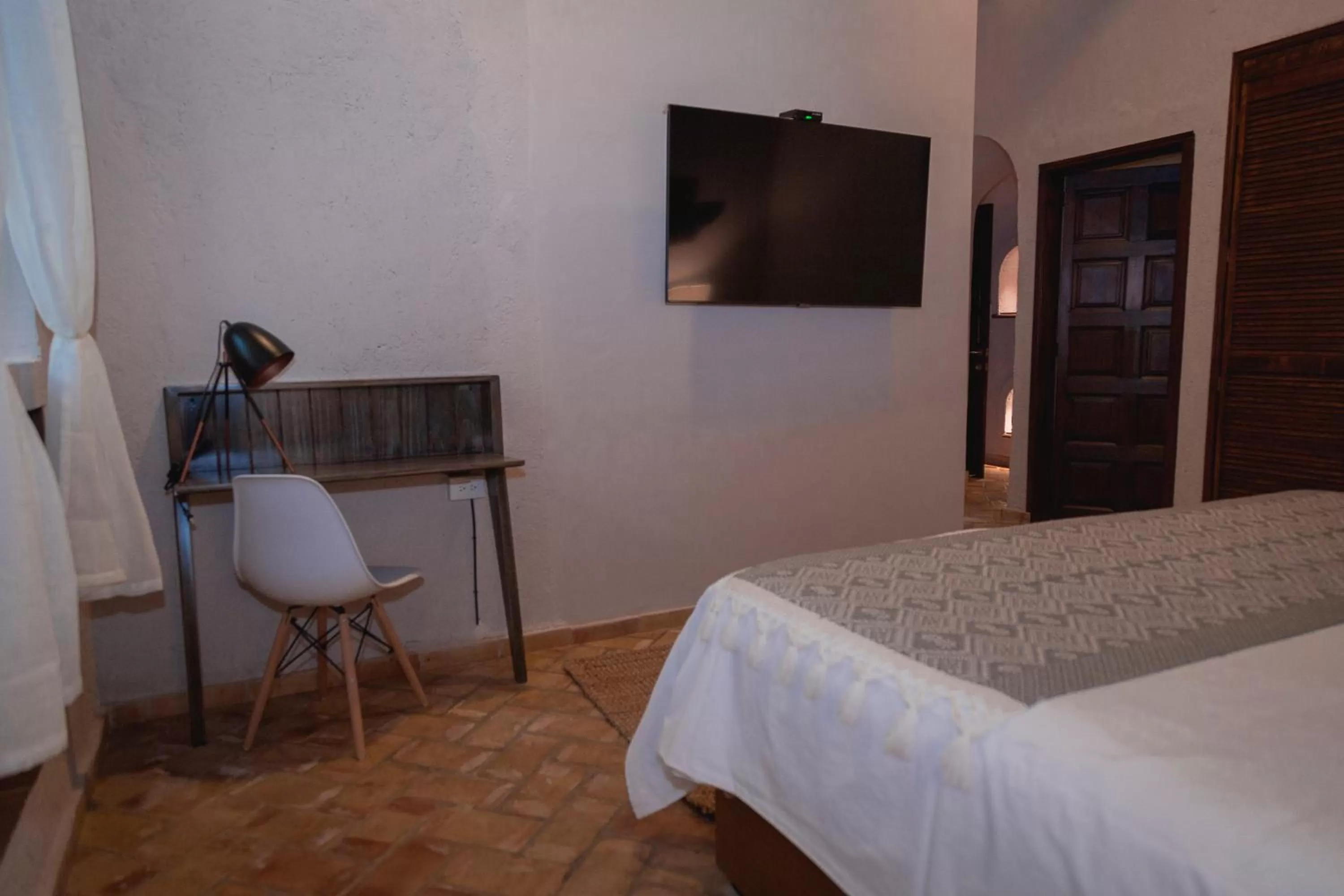 Communal lounge/ TV room, Bed in Casa Eva Hotel Boutique & Spa