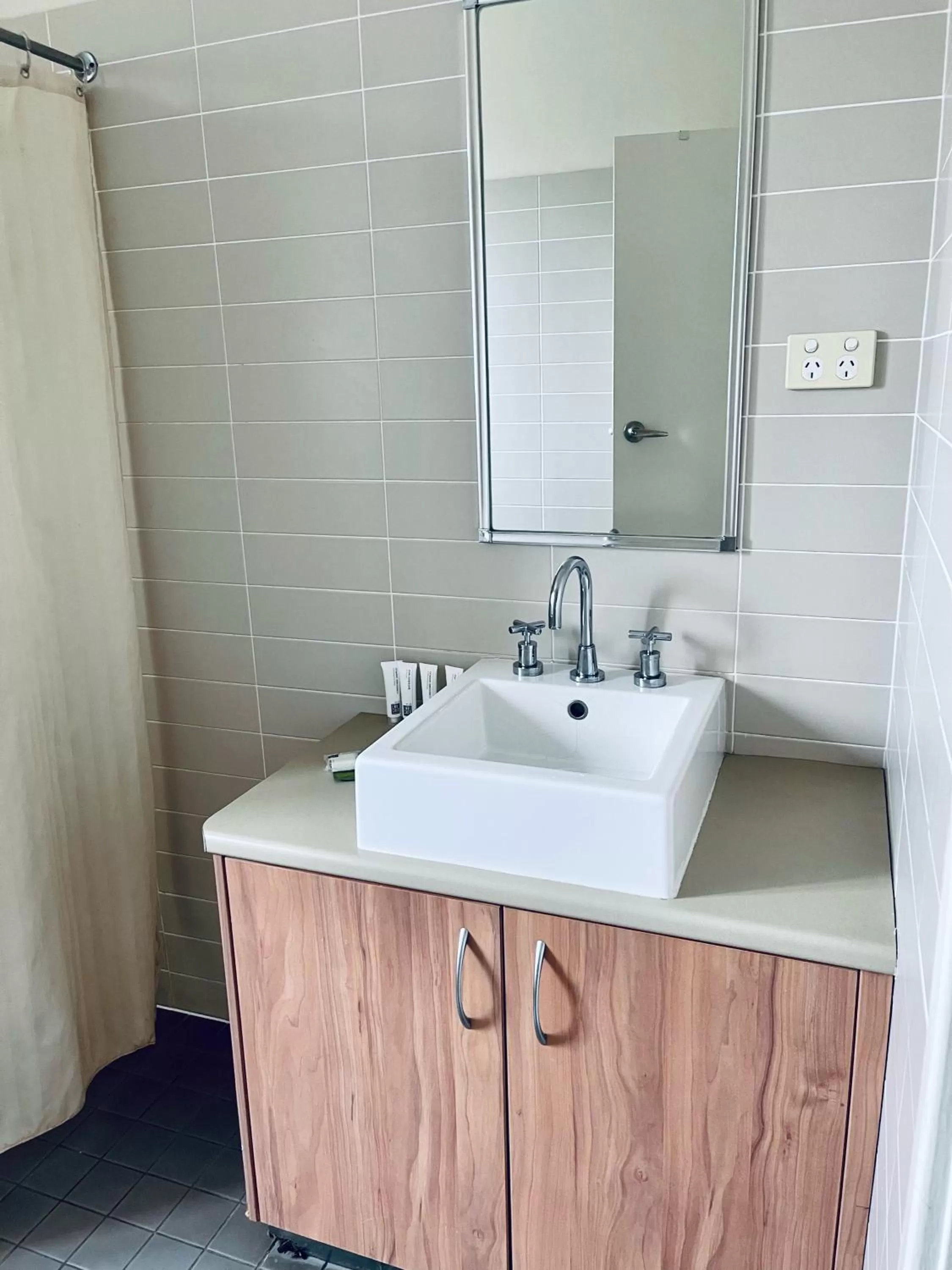 Bathroom in The Astor Hotel Motel