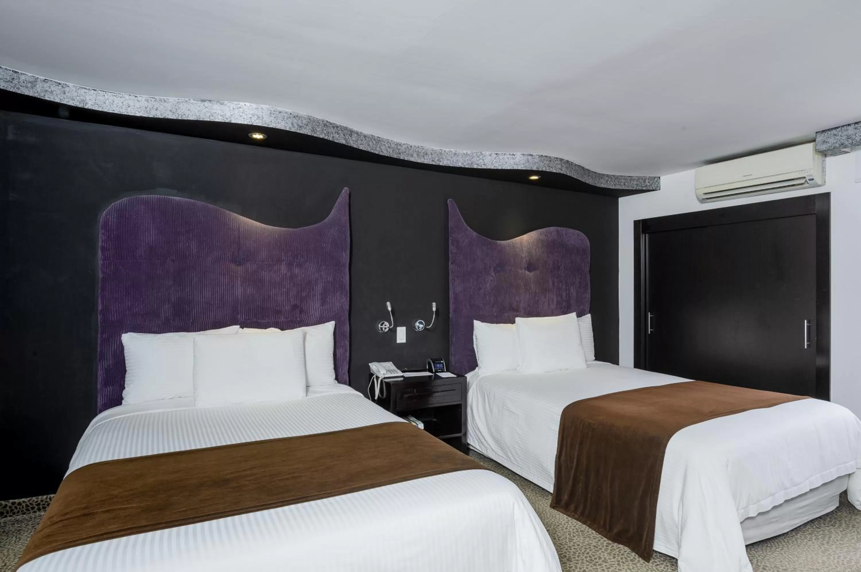 Bed in Riande Urban Hotel