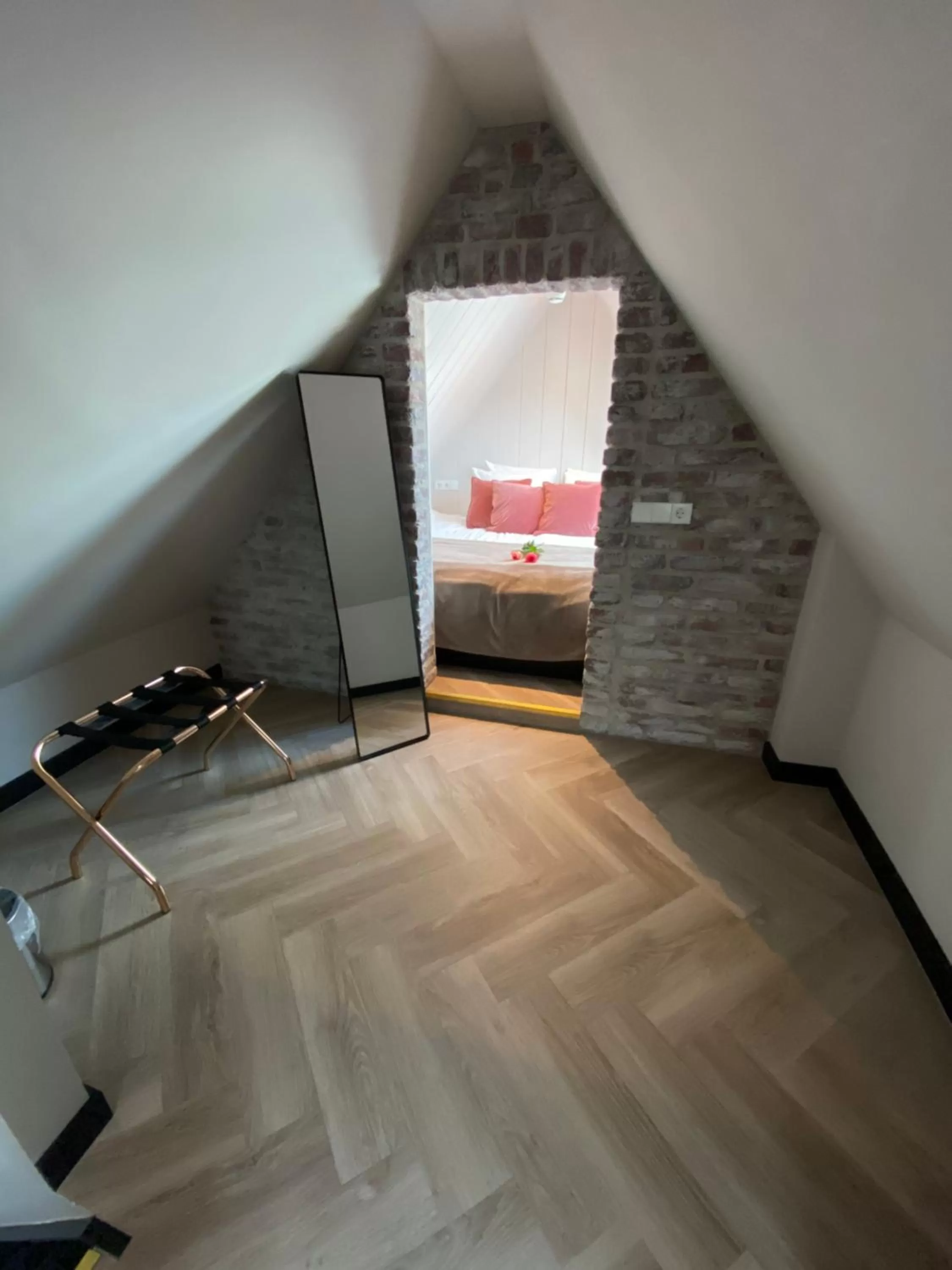 Bed in Harbour Suites Boutique Hotel