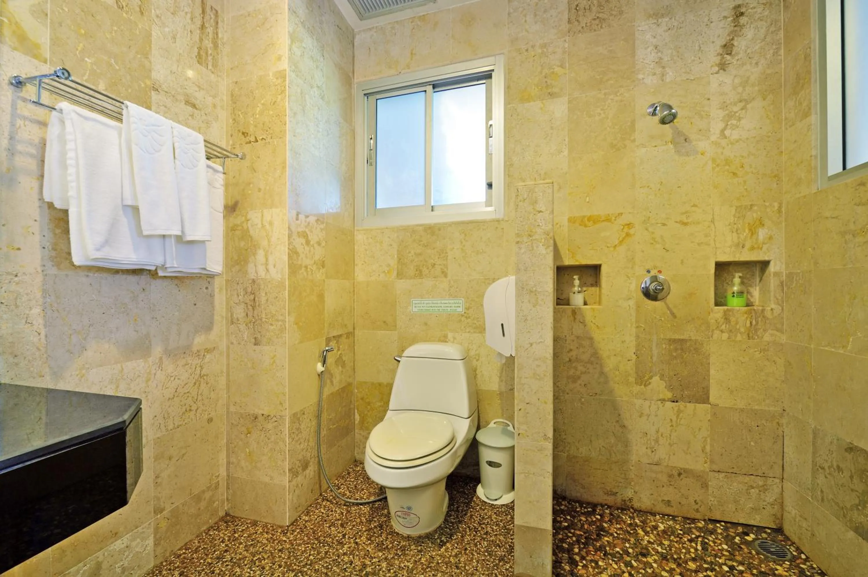 Toilet in Lanta Sand Resort & Spa