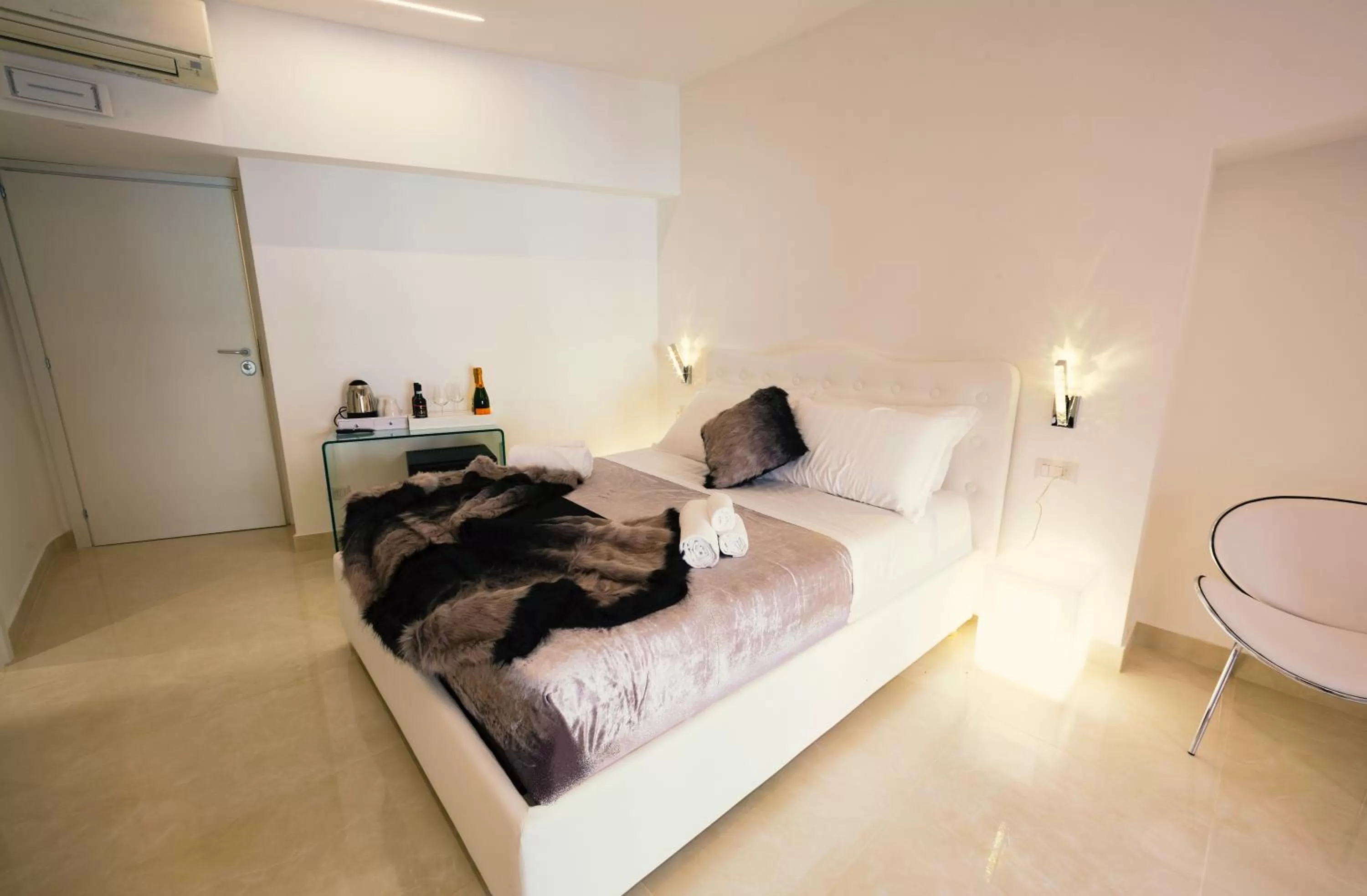 Bed in San Pietro Grand Suite