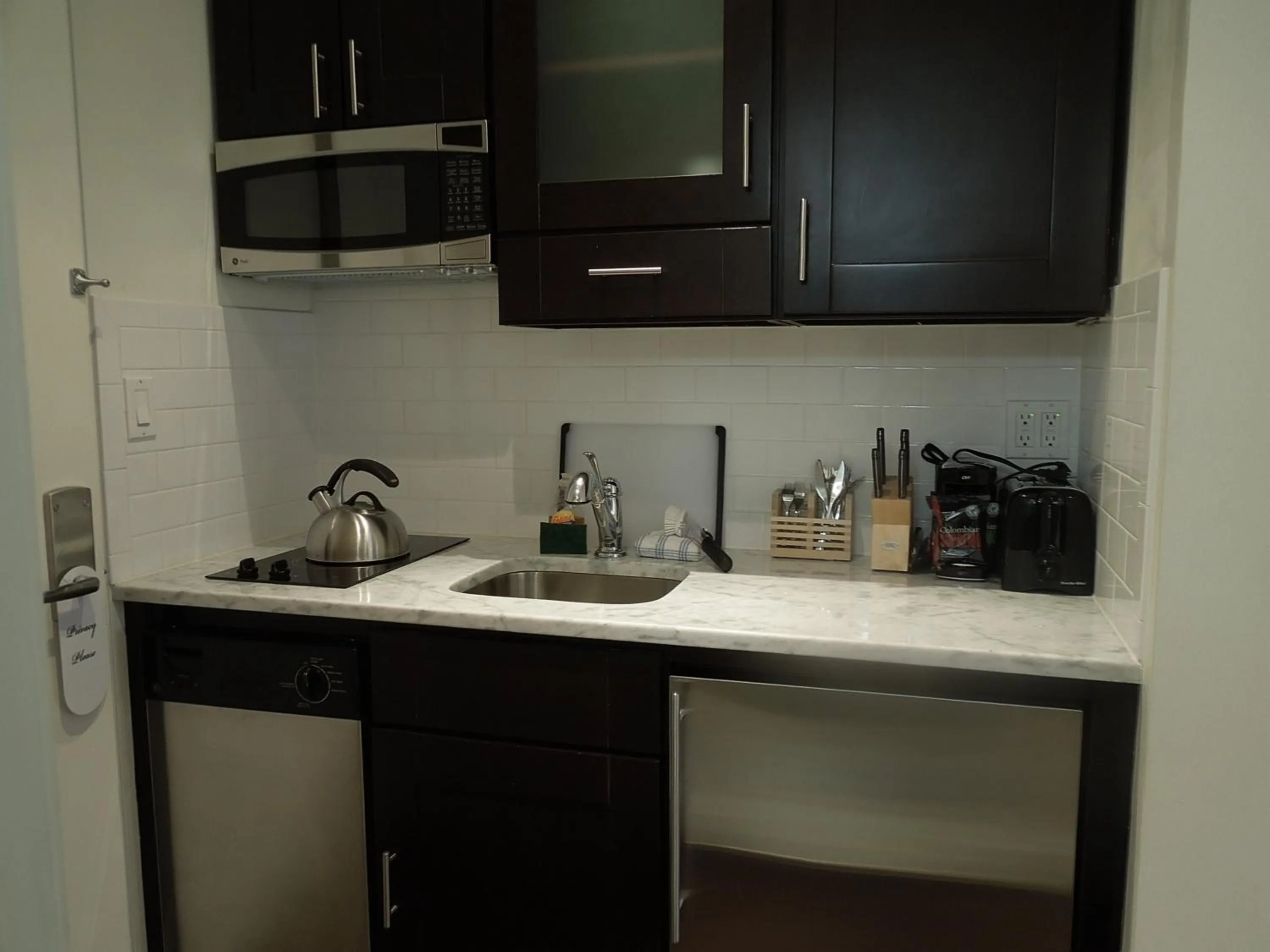 Kitchen or kitchenette in East Village Hotel