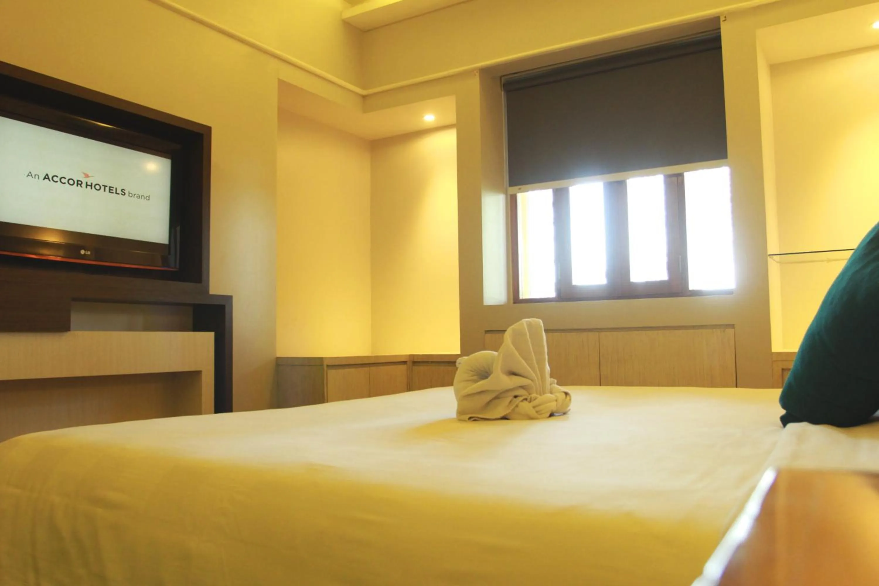 Bed in Novotel Surabaya Hotel