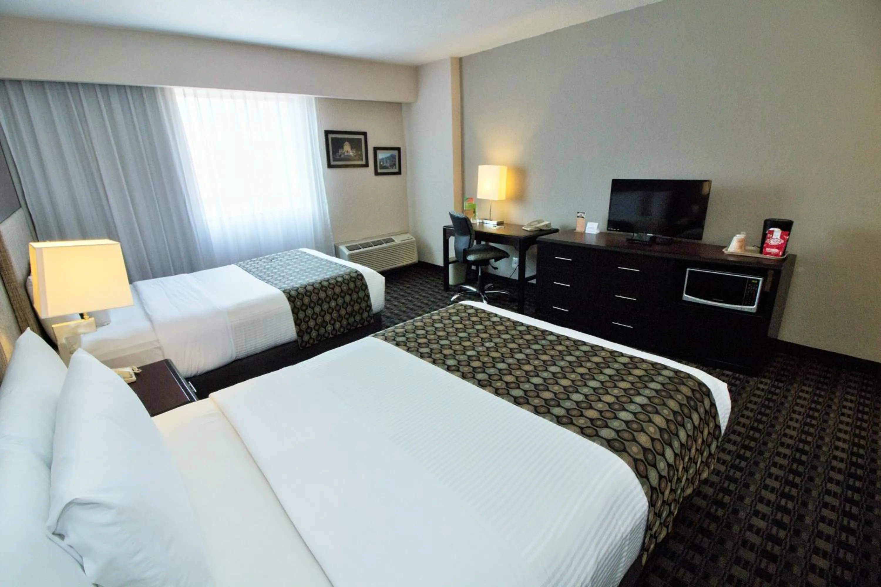 Bed in CHN Hotel Monterrey Norte, Trademark Collection by Wyndham