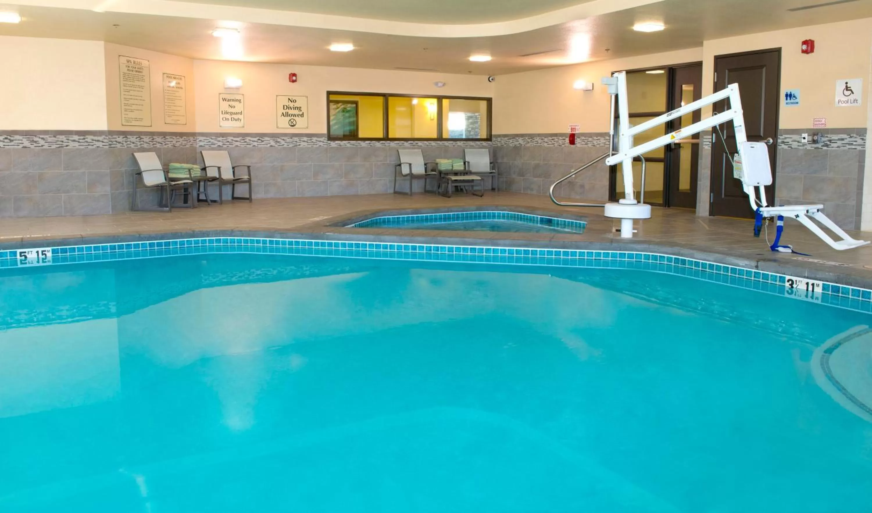 Swimming pool in Holiday Inn Express & Suites Colorado Springs Central by IHG
