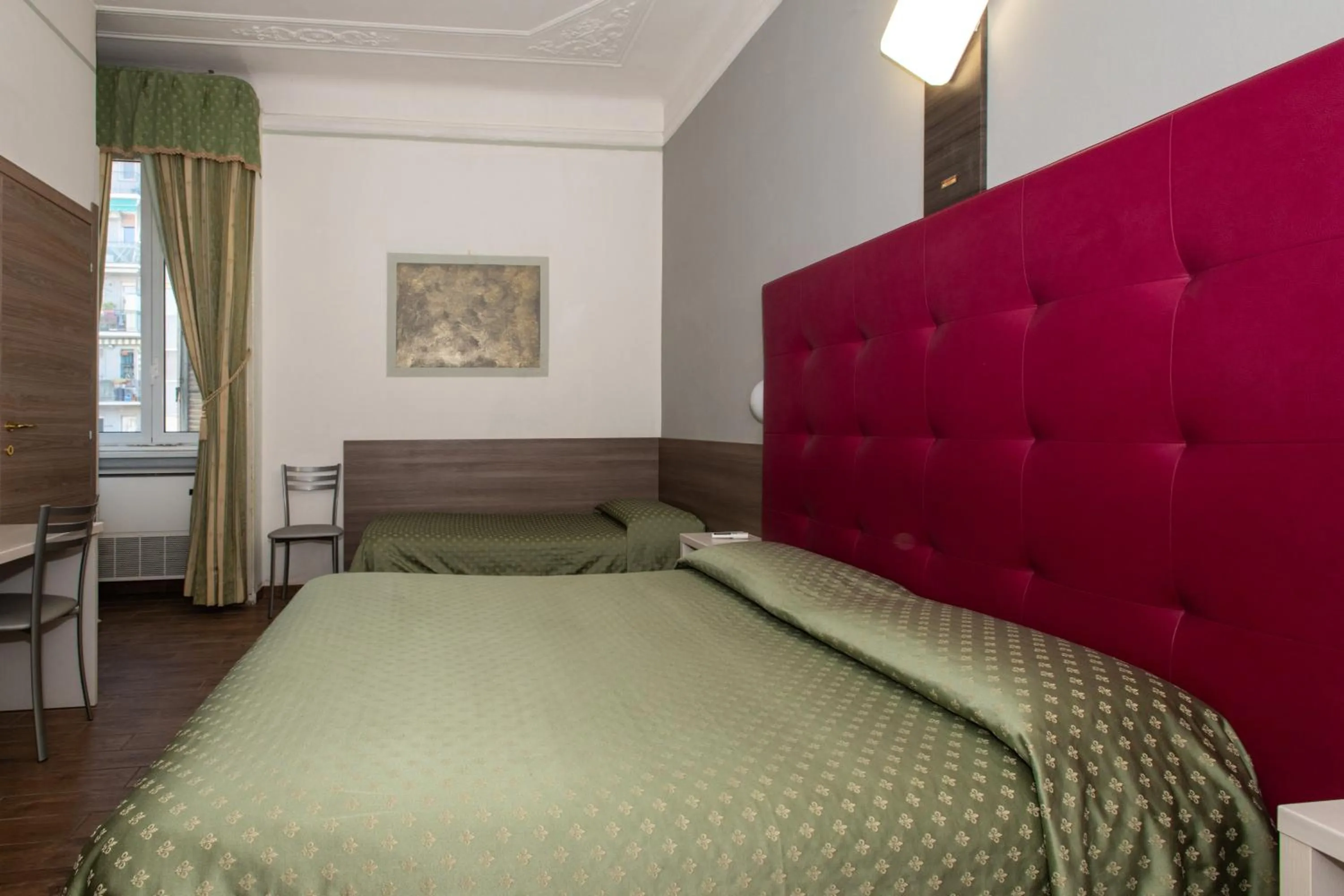 Bed in Hotel Piola