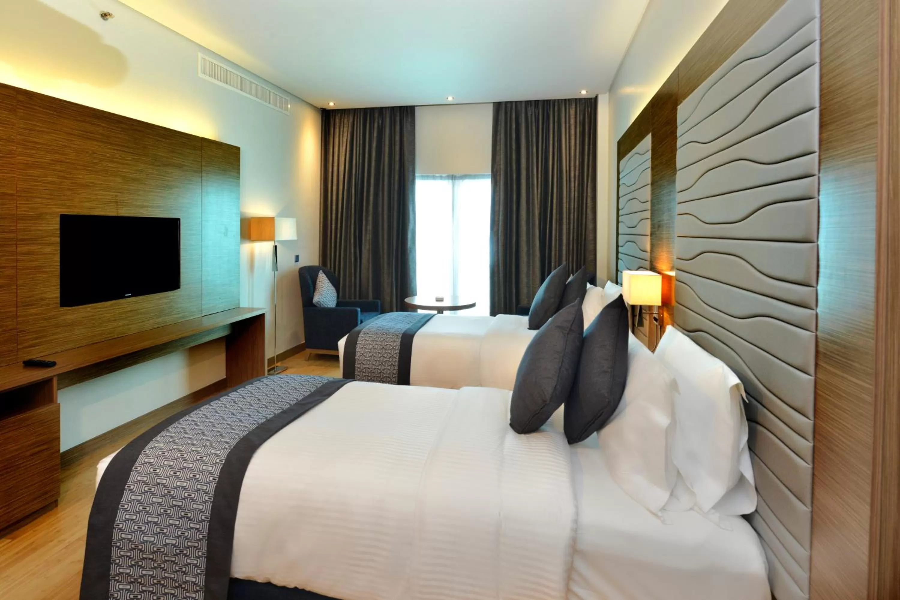 Shower, Bed in Ramada by Wyndham Manama City Centre