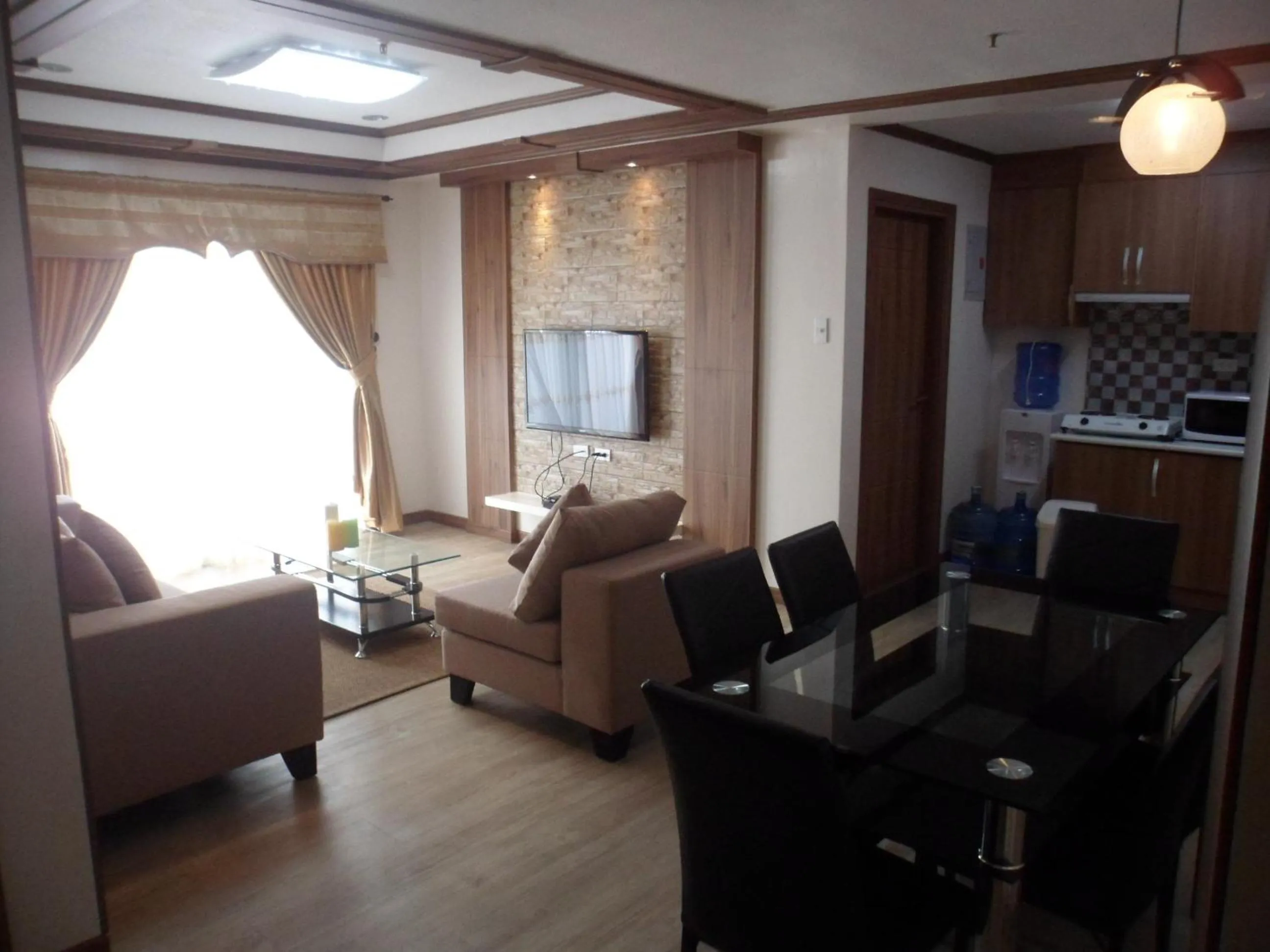 TV and multimedia in Prestige Vacation Apartments - Bonbel Condominium