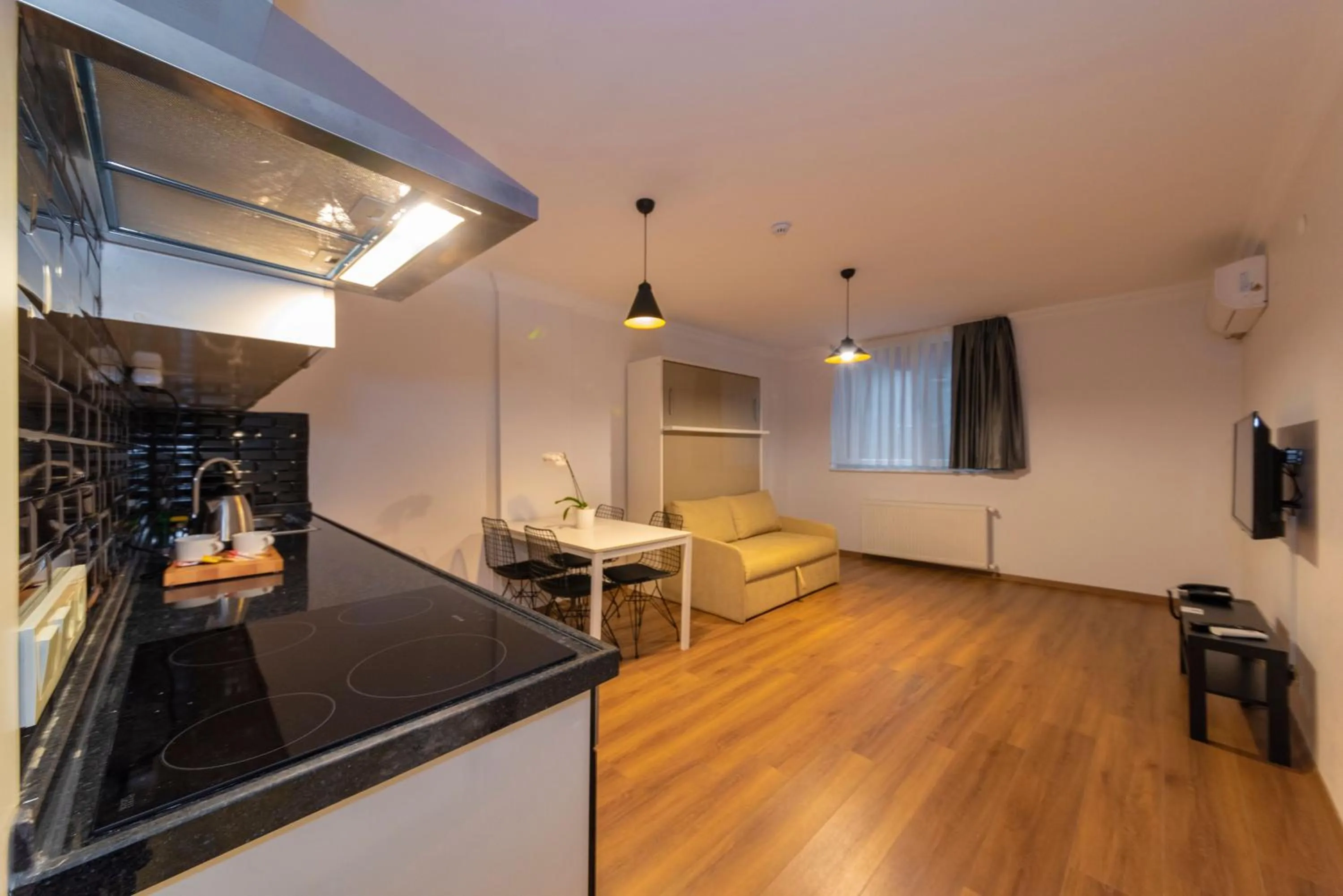 Kitchen or kitchenette in Joy Suites