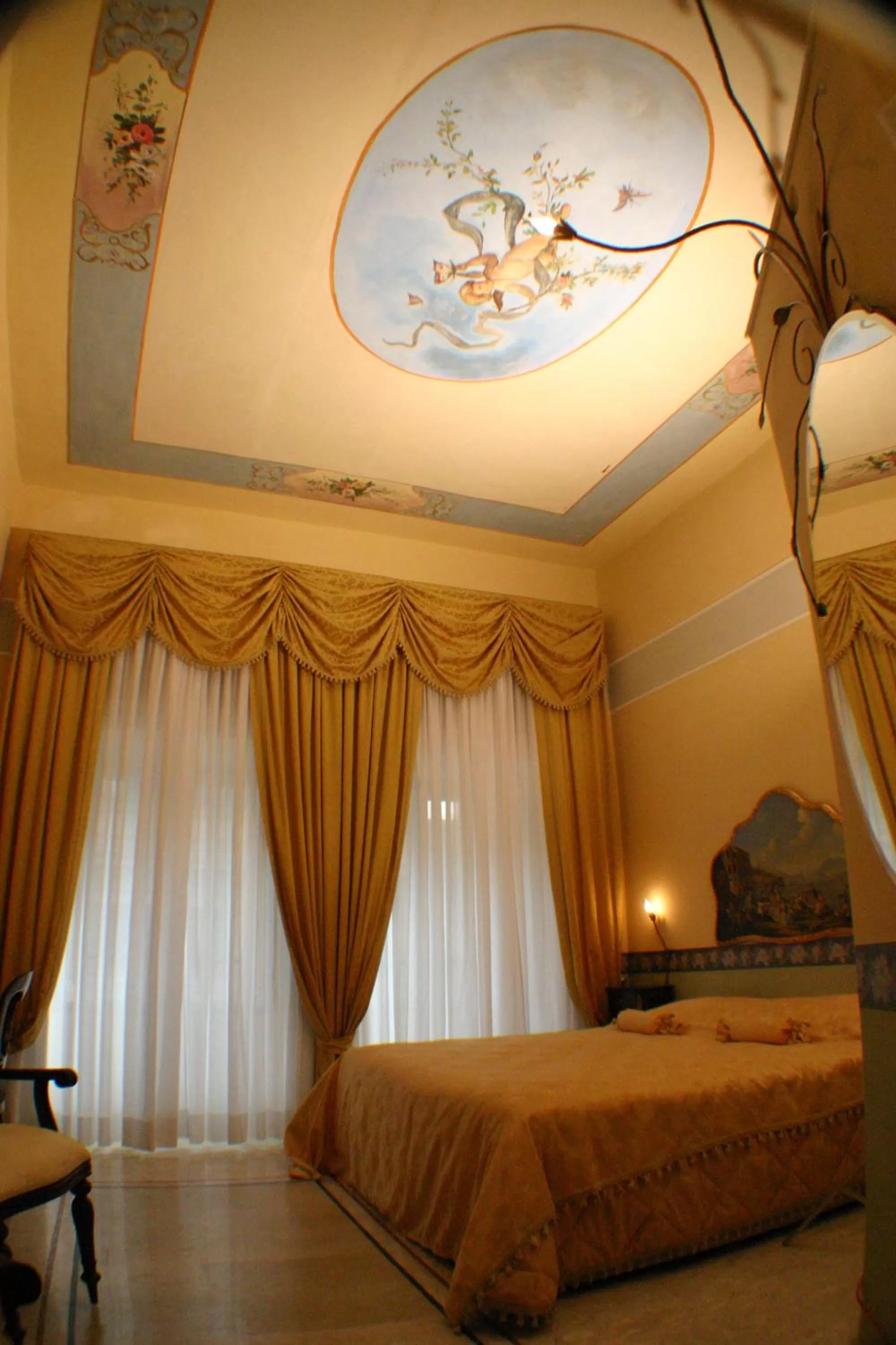 Decorative detail, Bed in Hotel Art Resort Galleria Umberto