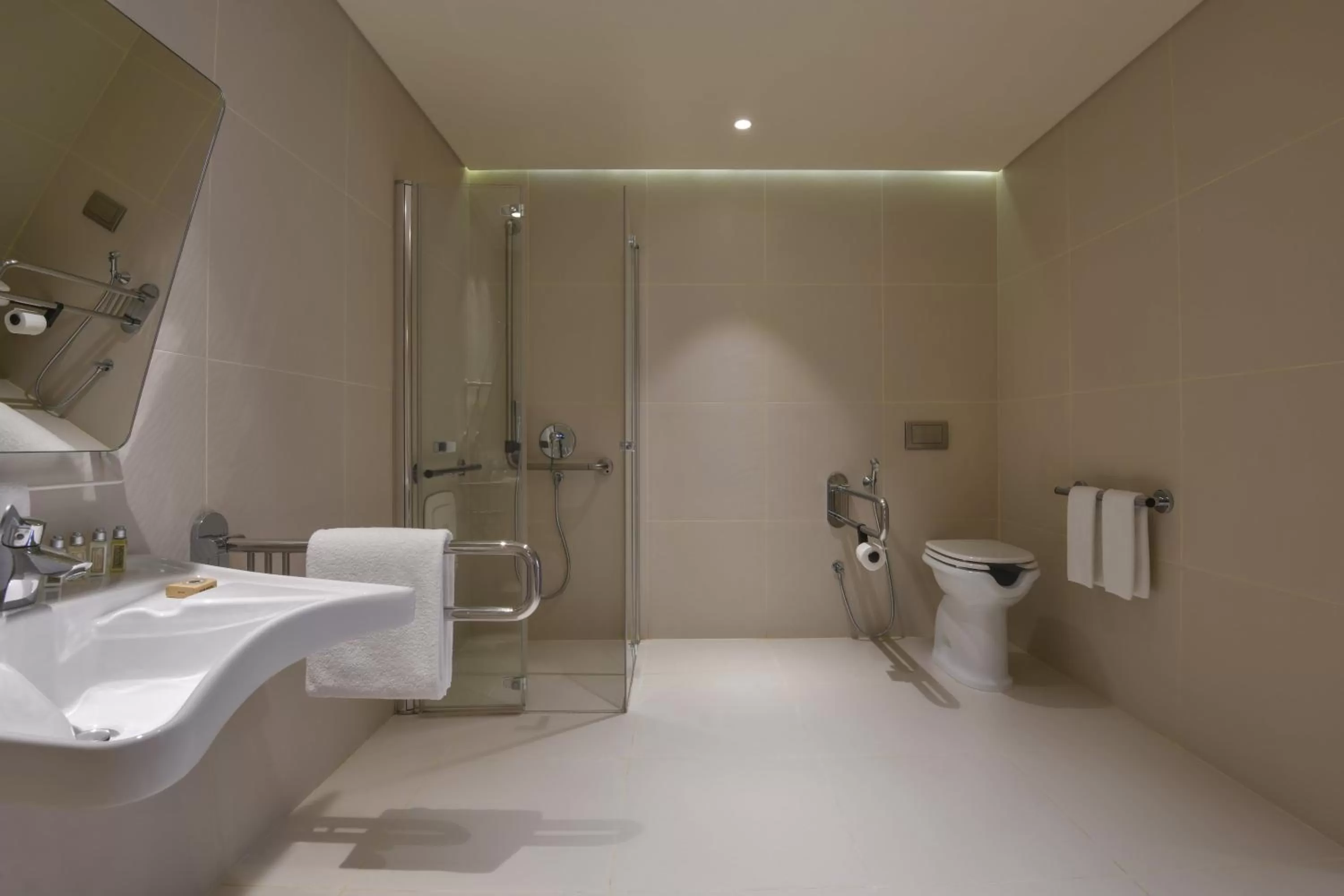 Bathroom in voco Doha West Bay Suites by IHG