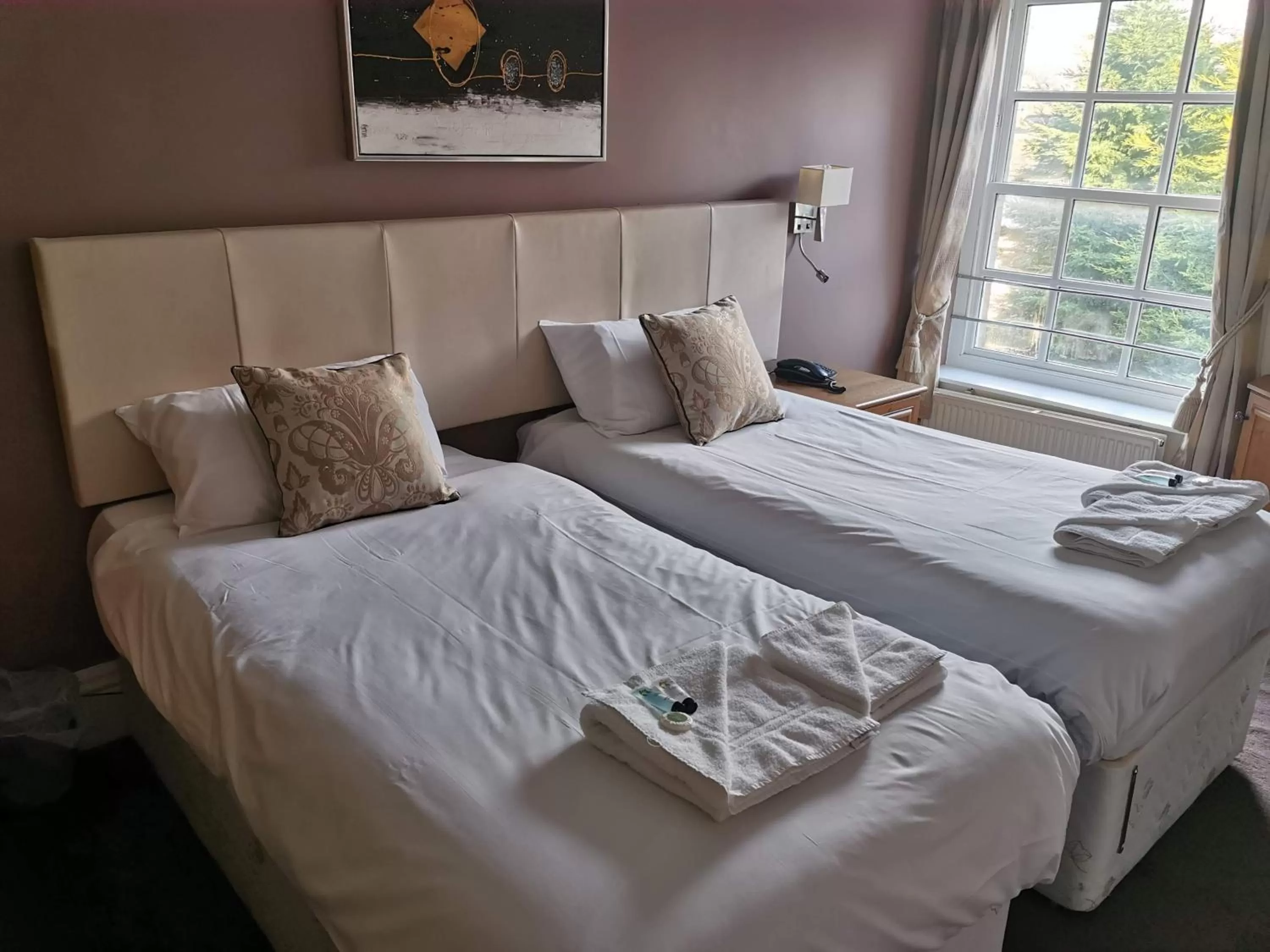 Bed in The Queens Hotel