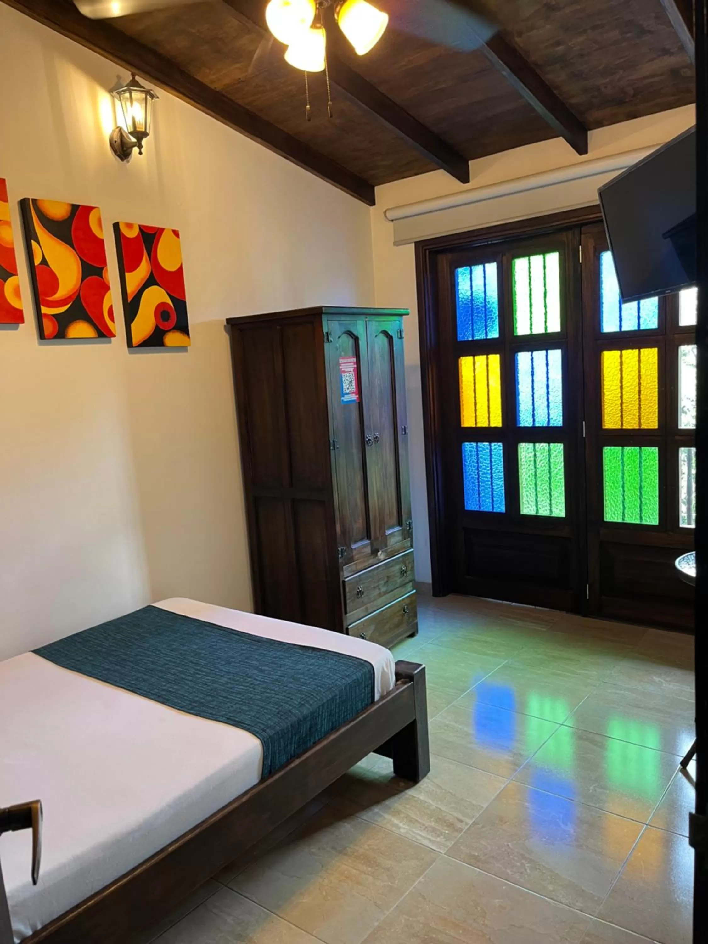 Photo of the whole room, Bed in Santiago DC Hotel