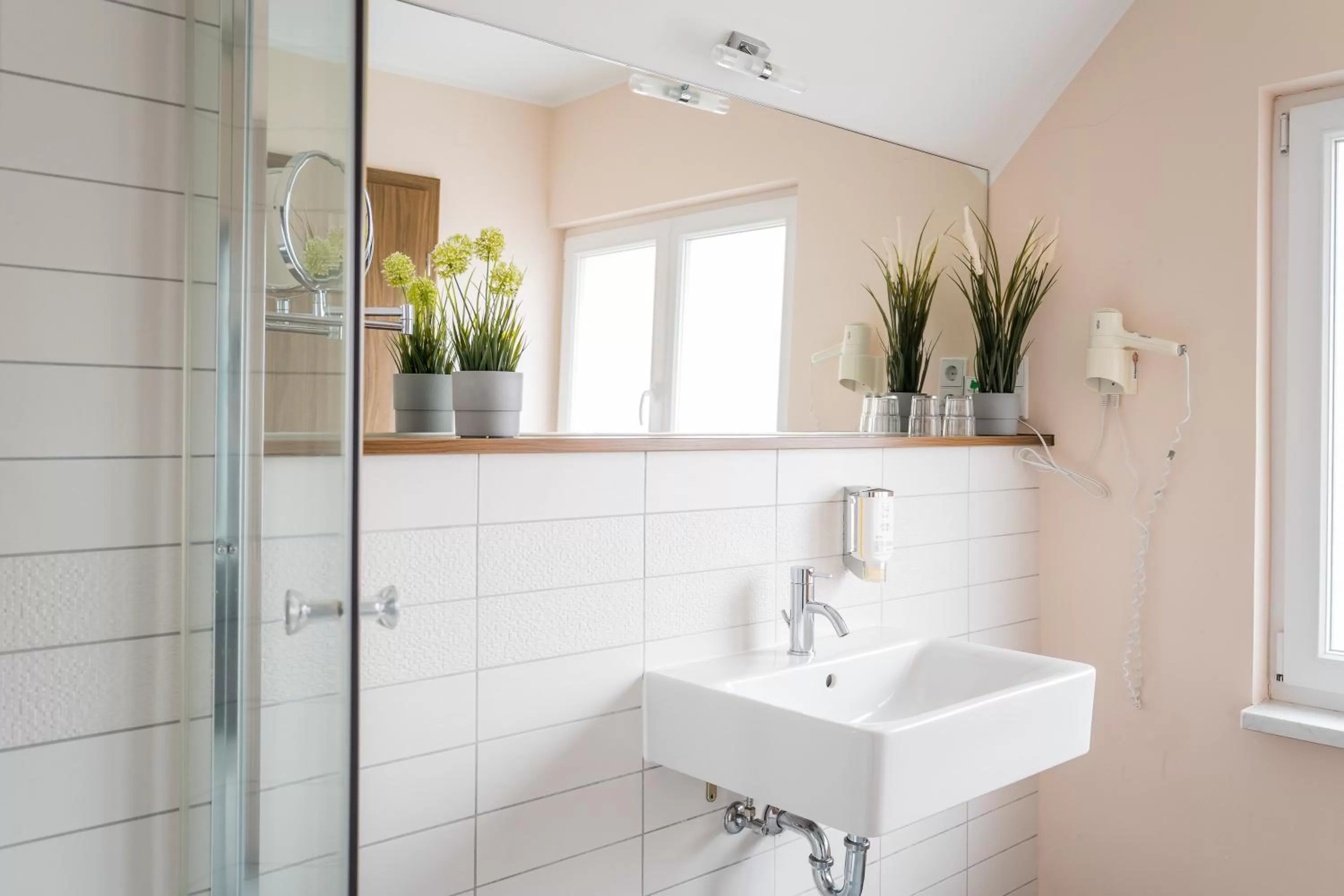 Bathroom in Point Hotel Apartments and Rooms