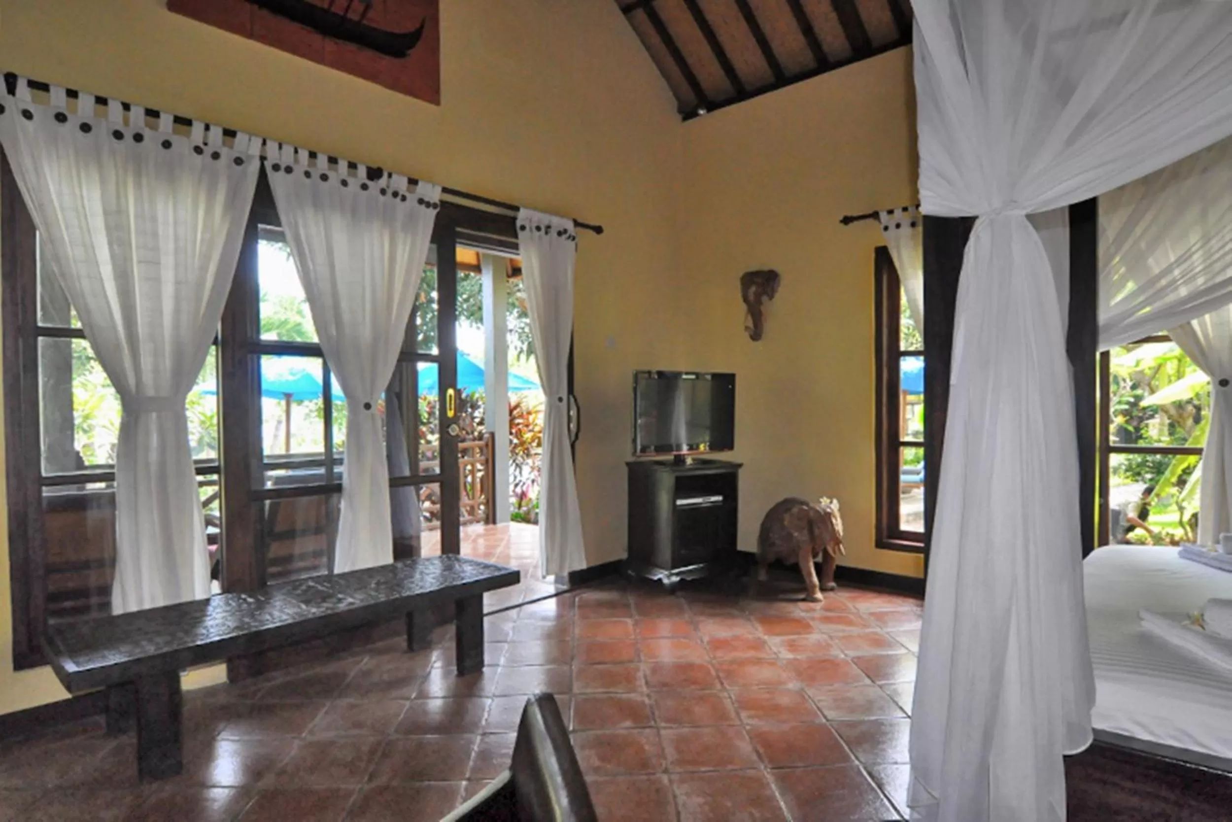 TV and multimedia, Bed in Puri Mangga Sea View Resort and Spa